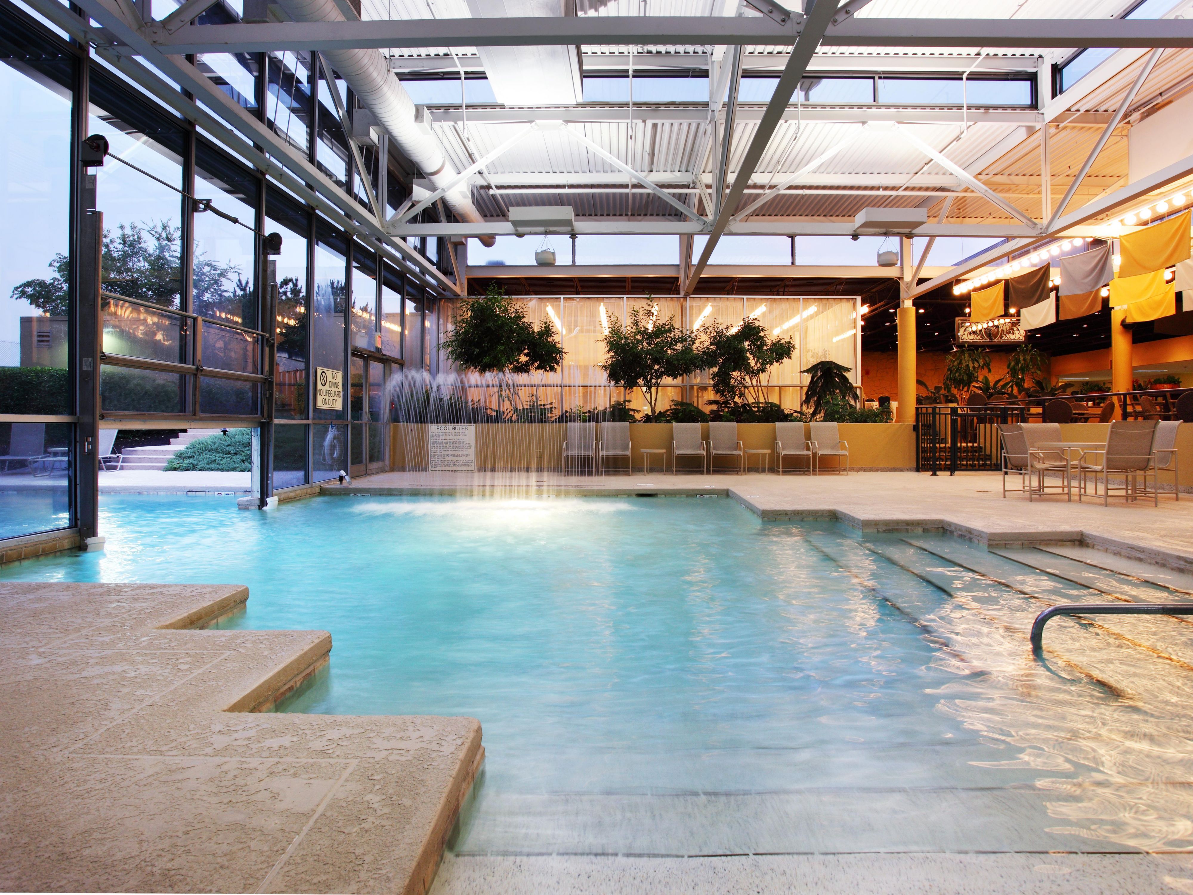 Whether you energize your morning with a refreshing swim, enjoy a refreshing mid-afternoon dip, or indulge in a soothing soak after a busy day, our indoor/outdoor pool is thoughtfully designed to provide both physical and mental relaxation. With a seamless transition between indoor and outdoor areas, you can enjoy the water no matter the weather.