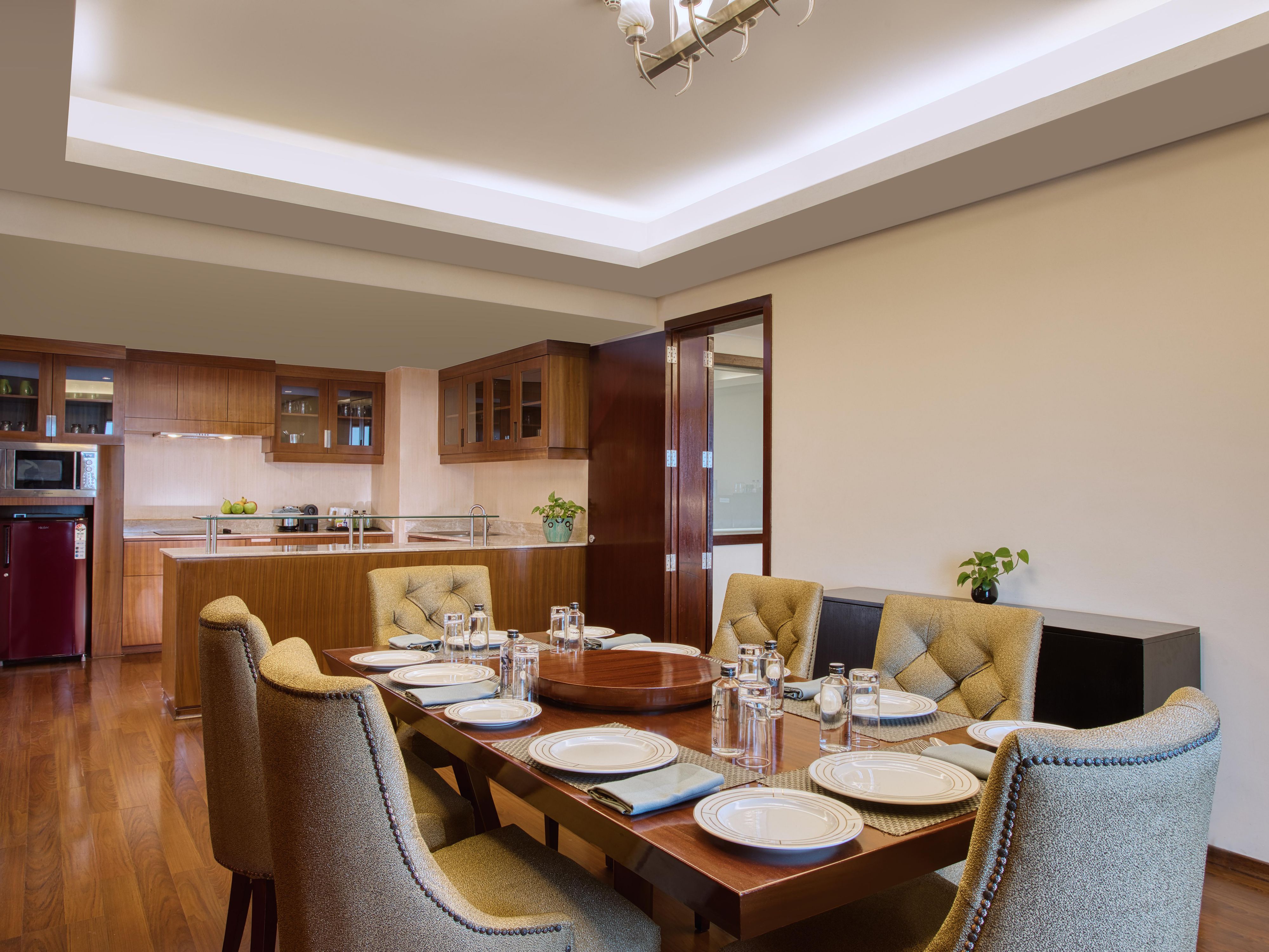 Indulge in the ultimate luxury experience in our 133 sqm Presidential Suite, featuring two beautifully appointed bedrooms and a spacious living and dining area. With breathtaking city views from the high floor and a private balcony for outdoor relaxation, this suite is your perfect urban retreat in Kochi.