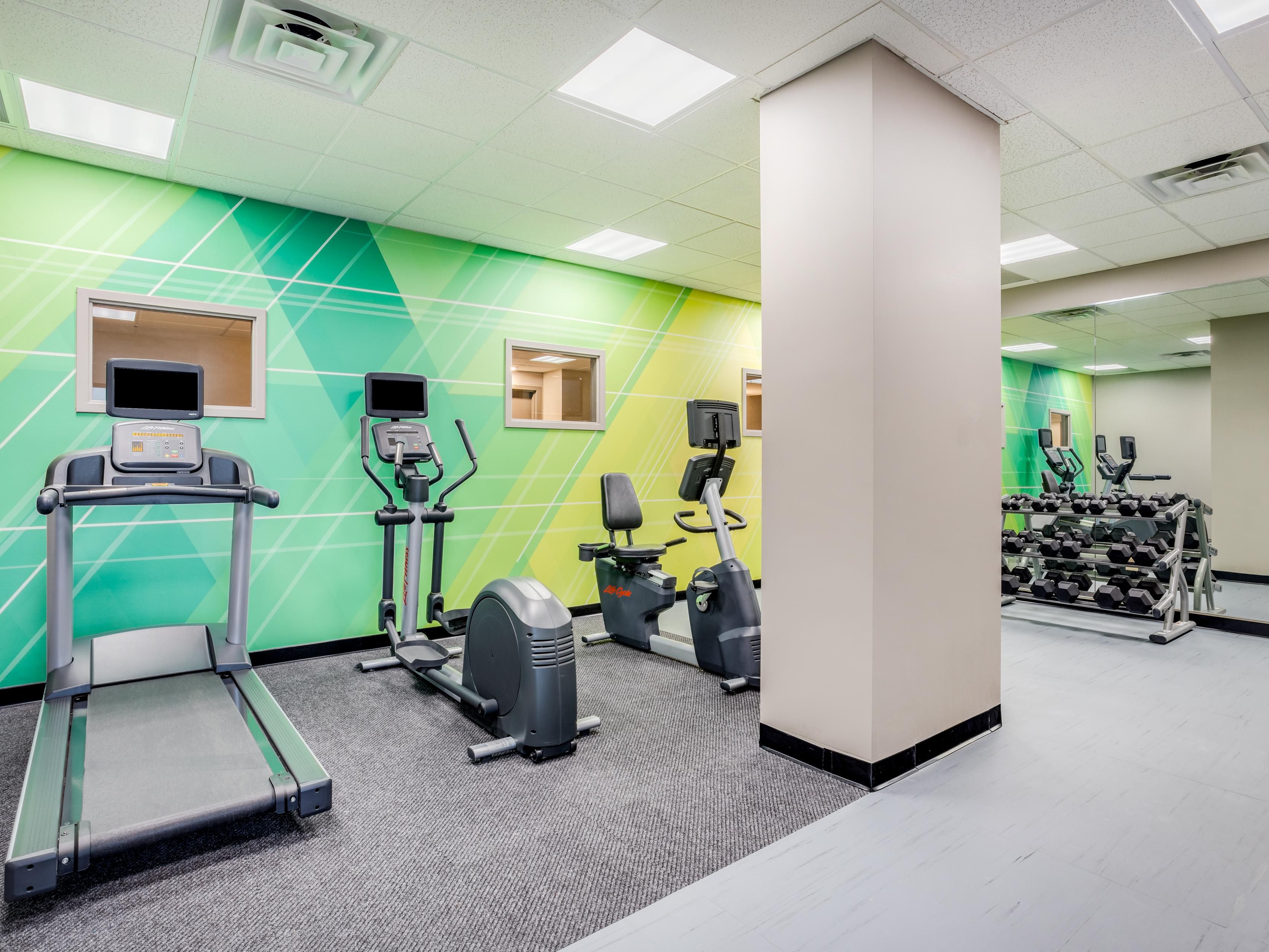 Recently renovated fitness center with free weights and cardio