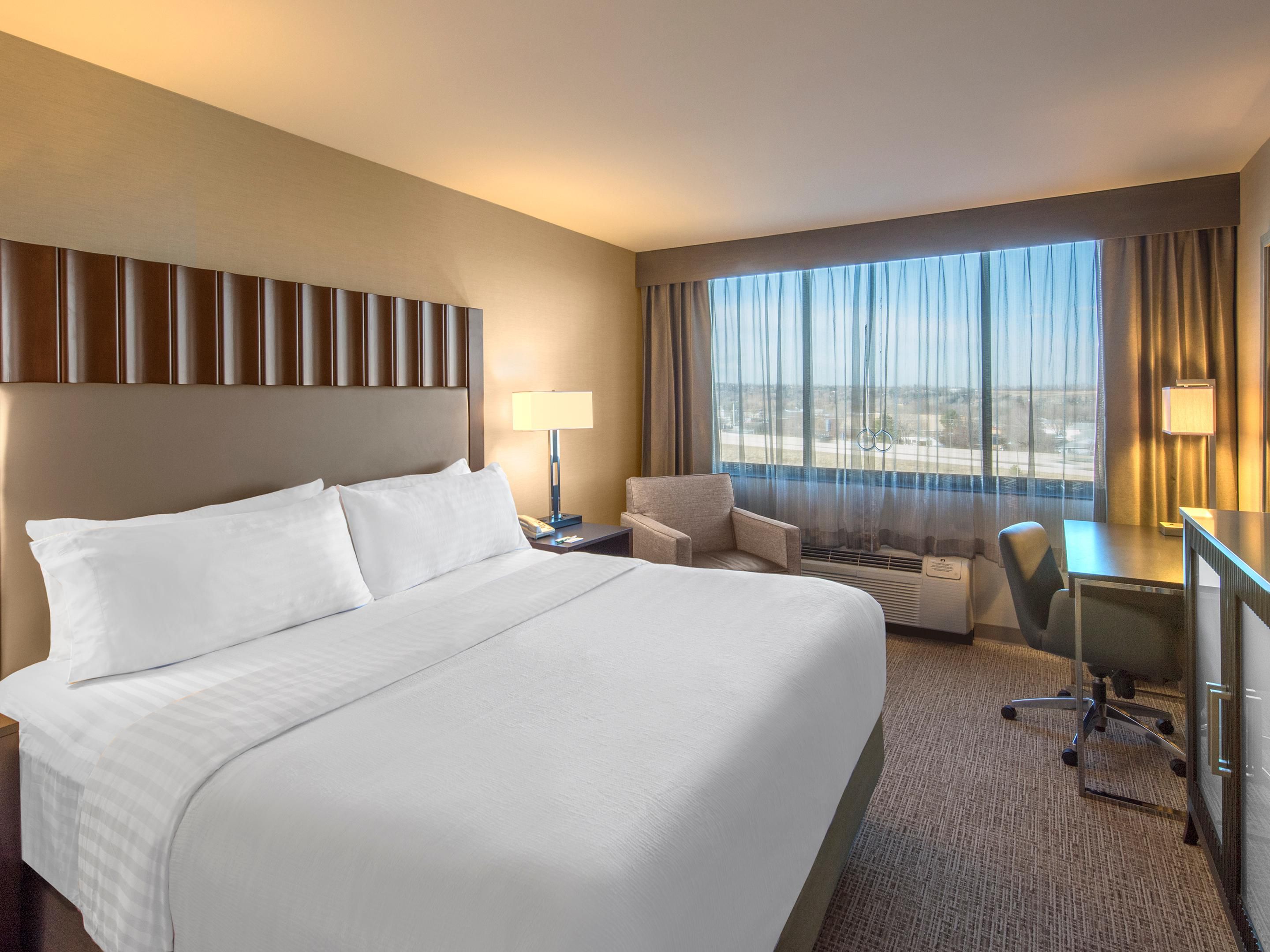 Relax in comfort with our King rooms, featuring walk-in showers for a refreshing stay. Enjoy all the essentials, including free WiFi, a mini fridge, a Keurig, and a spacious bathroom with well-lit mirrors and ample counter space. Whether you’re here for business or leisure, unwind in style with everything you need for a perfect stay.