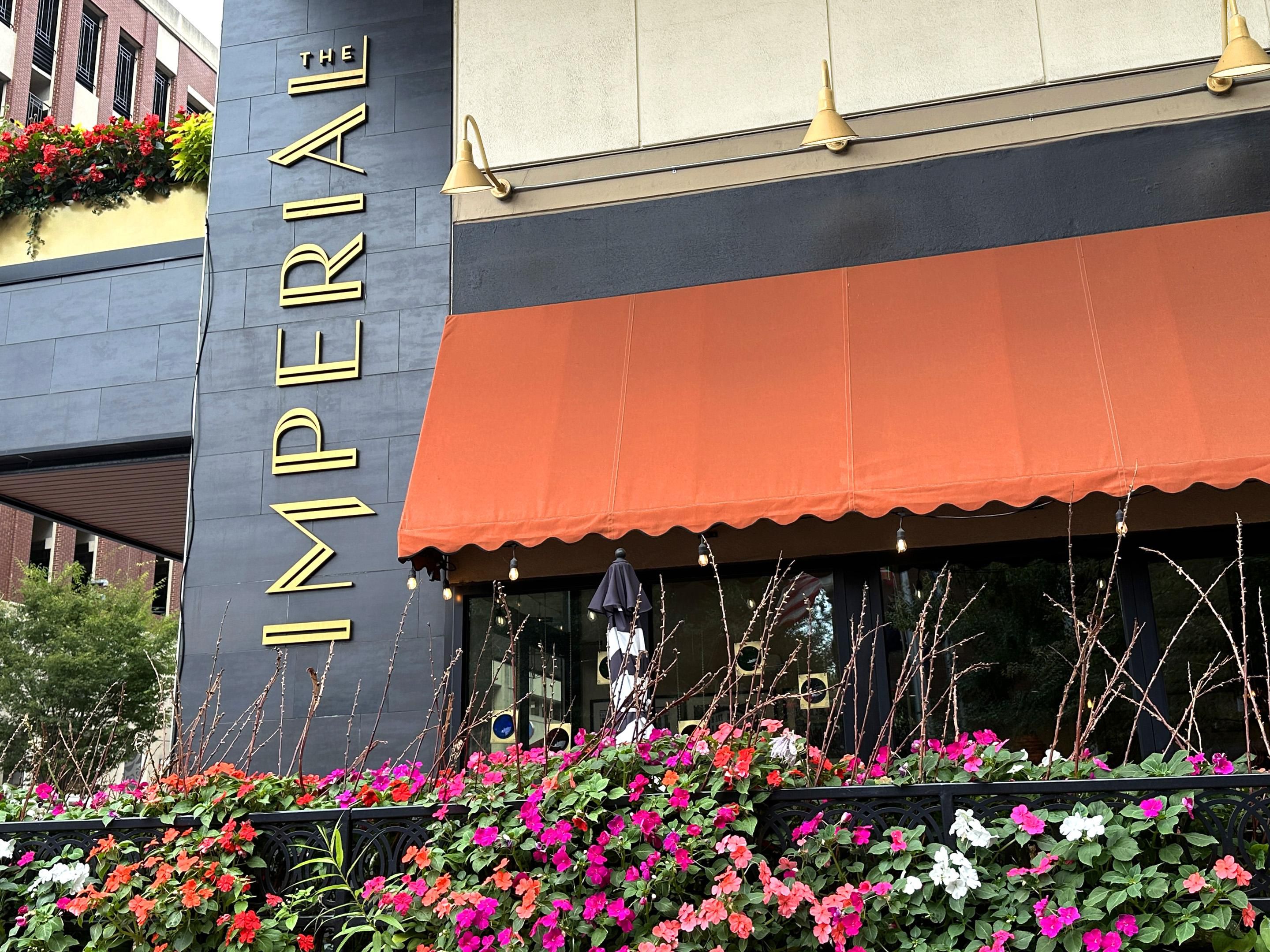 Relax at The Imperial Bar, a unique and sophisticated venue with a relaxing atmosphere. Enjoy a handcrafted cocktail, beer, or wine while admiring custom artwork by a renowned local artist. Our chef-inspired bar menu offers delicious selections to complement your beverage, making it a perfect spot to unwind and enjoy the vibrant, creative flair.