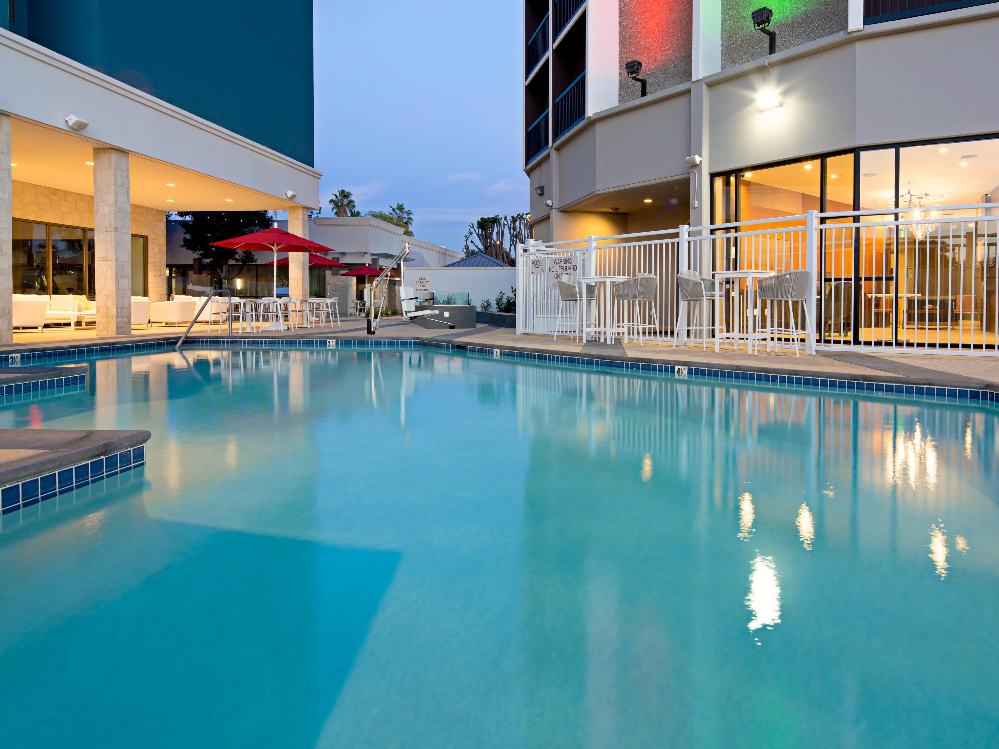 Enjoy sunbathing by the pool in the California sunshine.