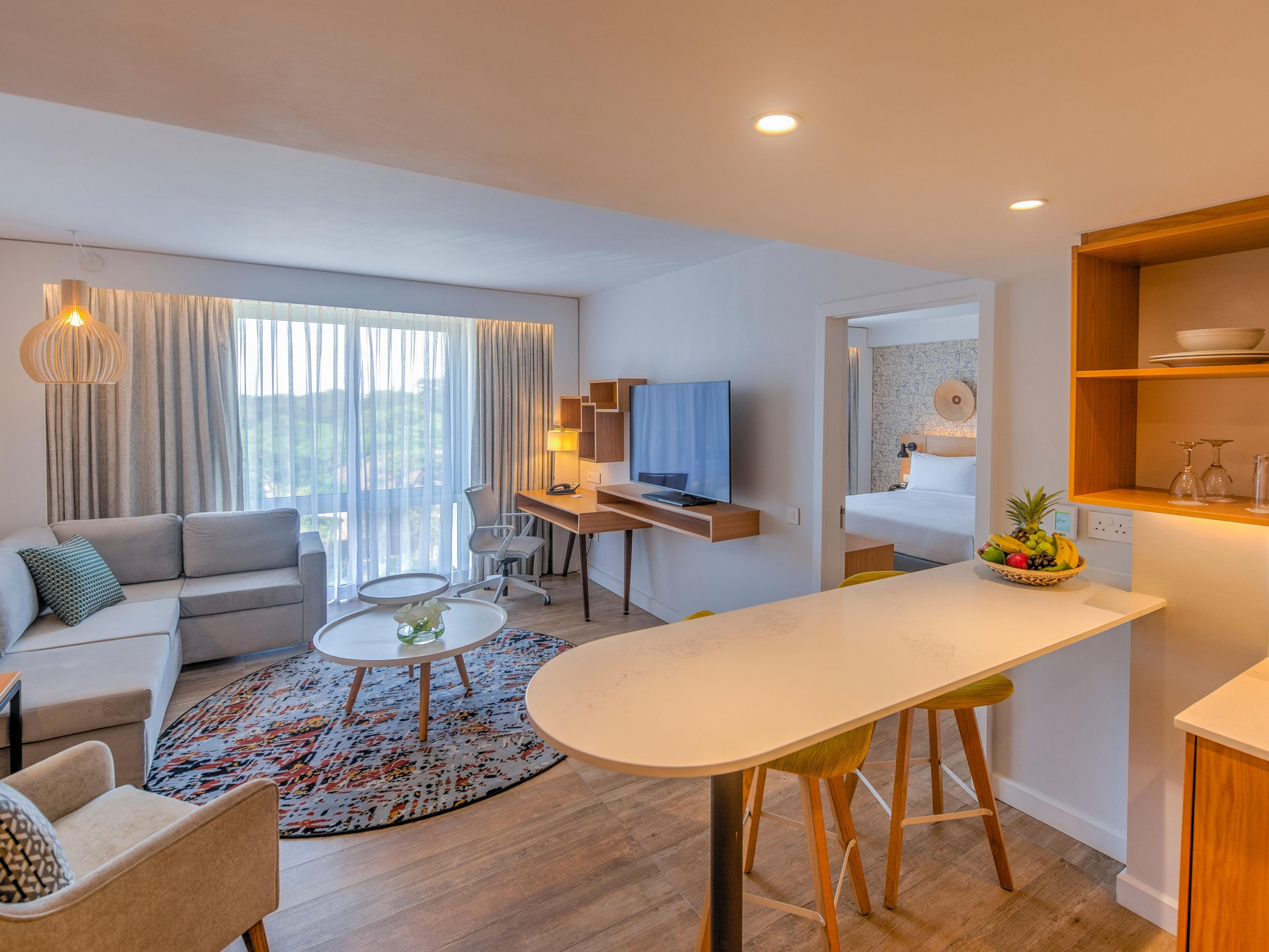 Stay in the blissful comfort of our one-bedroom apartment, where a welcoming lounge, full kitchenette, and a spacious king-sized bed awaits.  Unwind with free Wi-Fi, LCD TV, a mini bar fridge, and the added convenience of coffee or tea-making facilities with 24-hour dedicated room service to make you feel at home.