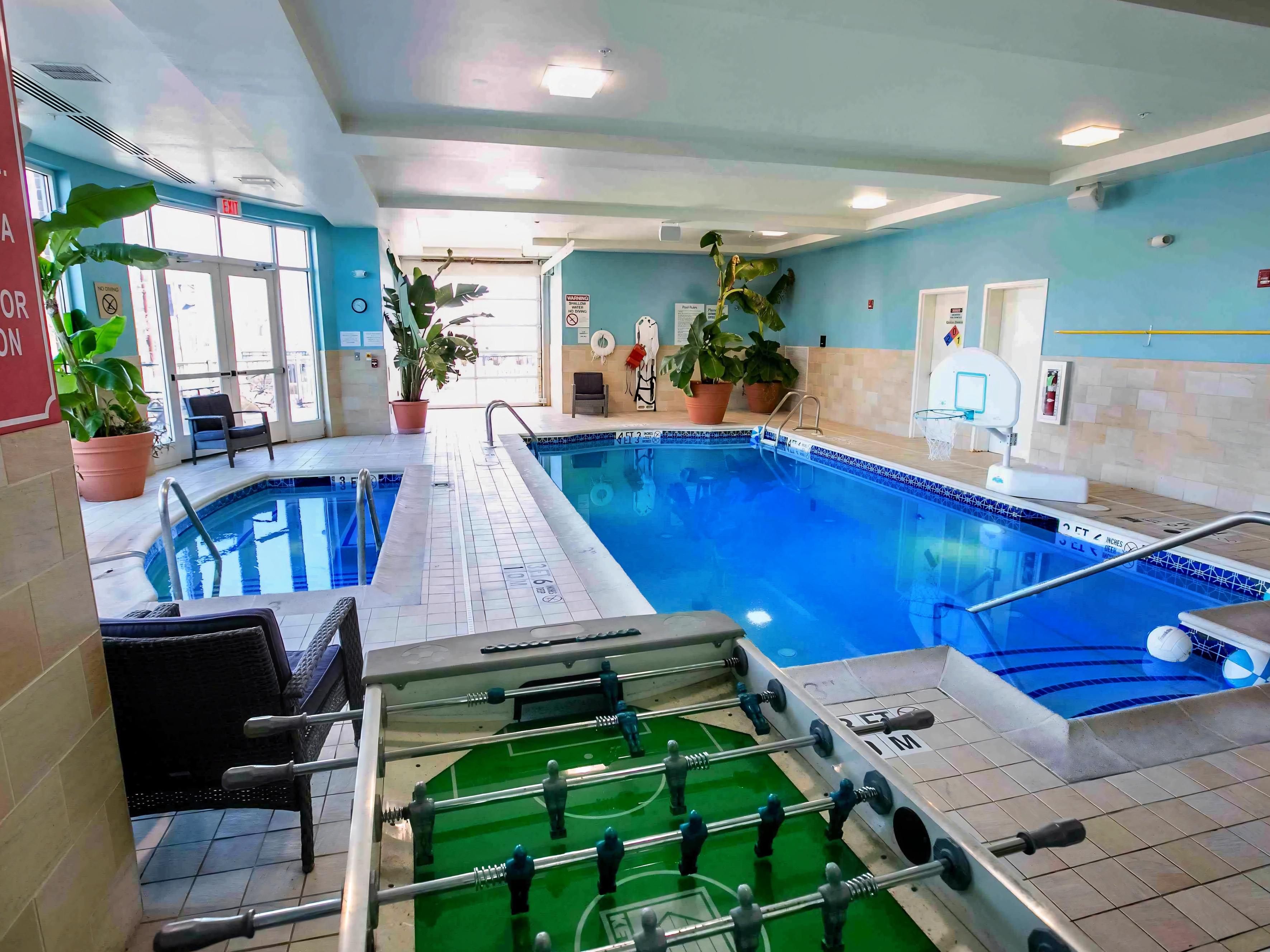 Indoor pool and hot tub on property