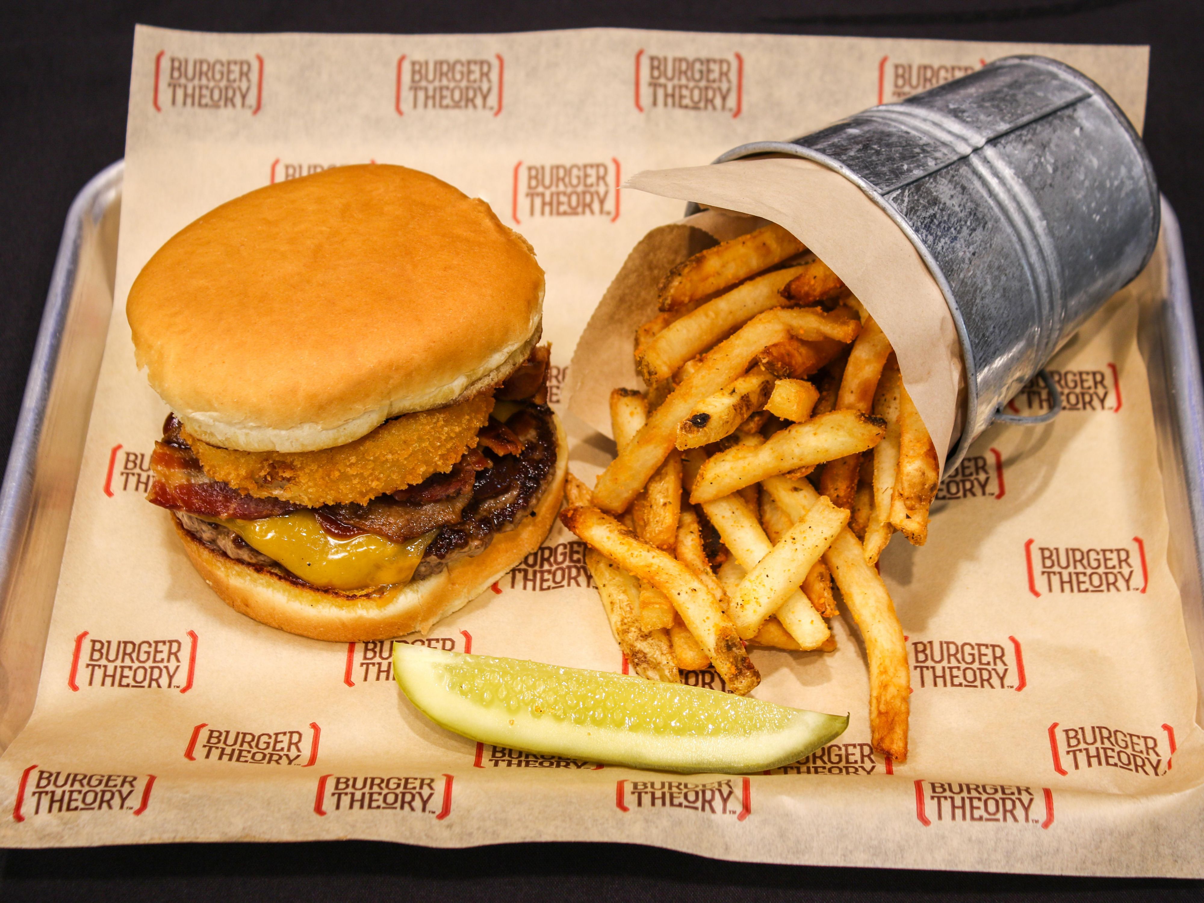 Savor mouthwatering burgers, crisp salads, and crave-worthy appetizers at Burger Theory, our on-site restaurant. Customize your perfect burger with a variety of fresh toppings, and pair it with a local draft or cocktail from the full bar. Whether you're dining solo or with family, it's the perfect place to unwind and enjoy a delicious meal.
