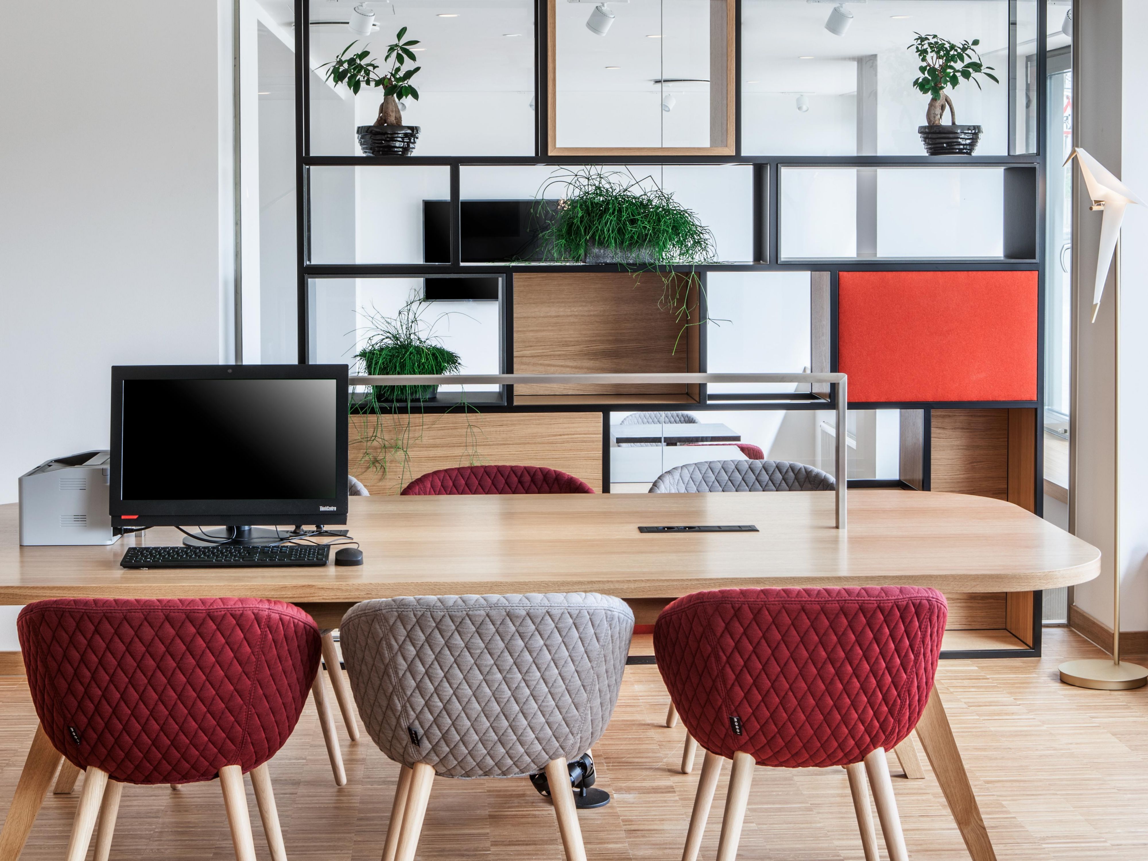 The Open Lobby with a computer and convenient charge points.