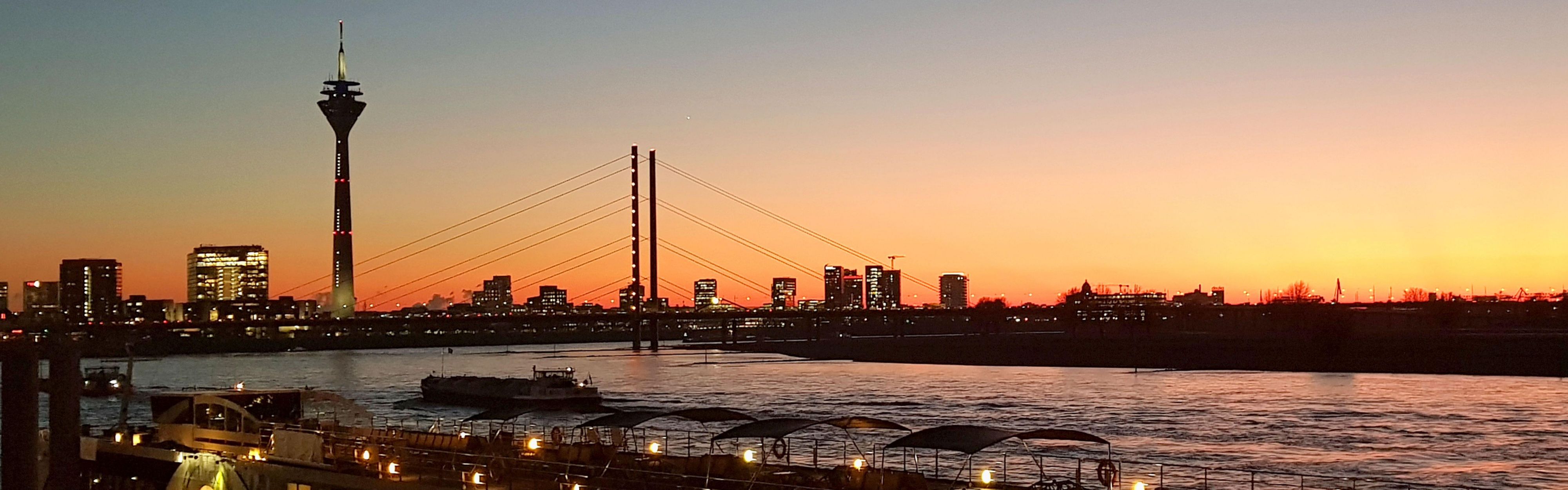 Rhine bank Düsseldorf after sunset.