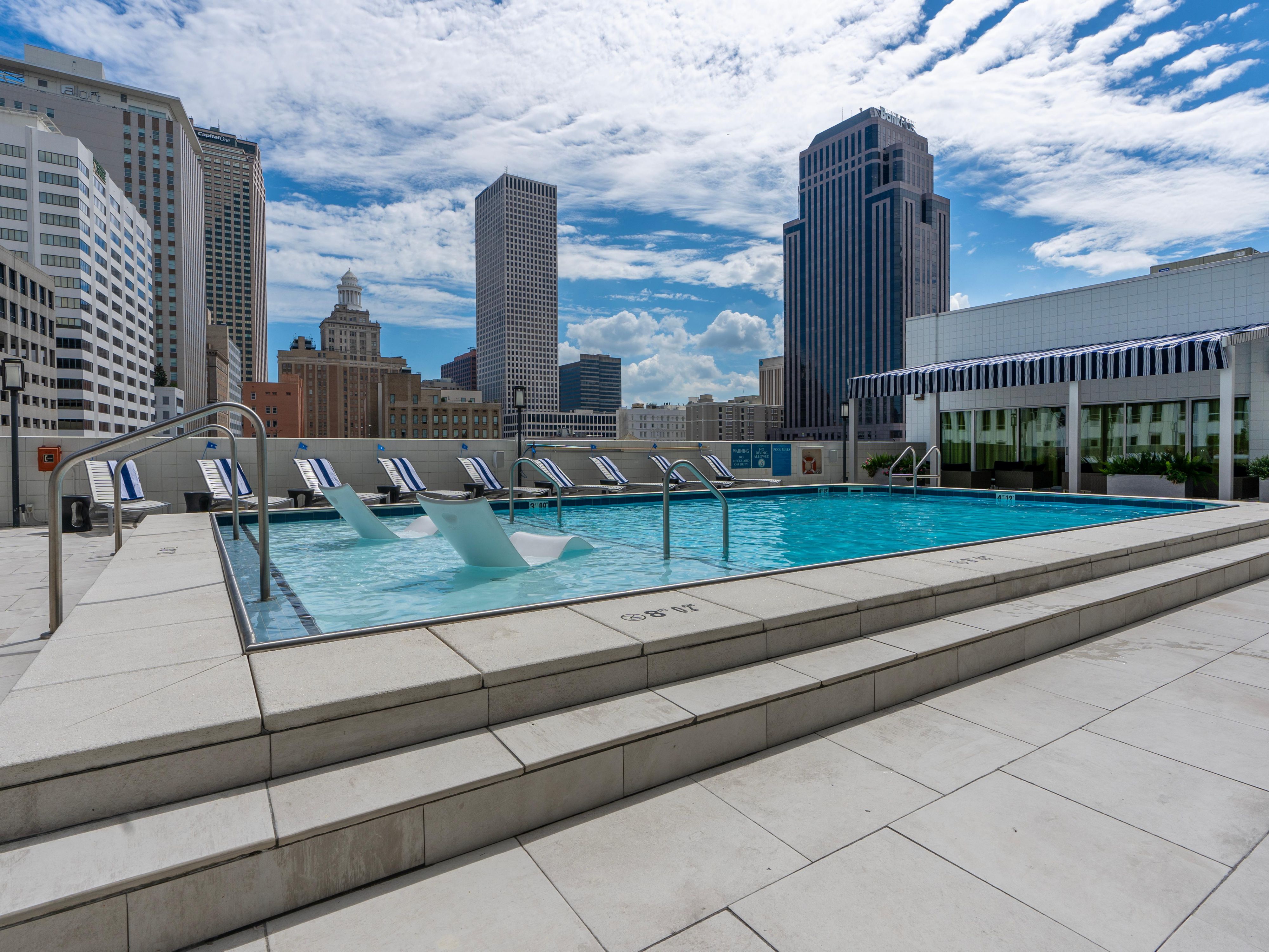 At our hotel near the New Orleans French Quarter, thoughtful amenities await at every turn. Energize your day in the Fitness Center or unwind at the rooftop pool and patio. Savor delicious dining at our onsite restaurant and enjoy city views overlooking Caesar's Superdome. Take advantage of free Wi-Fi and onsite parking for a hassle-free stay.  