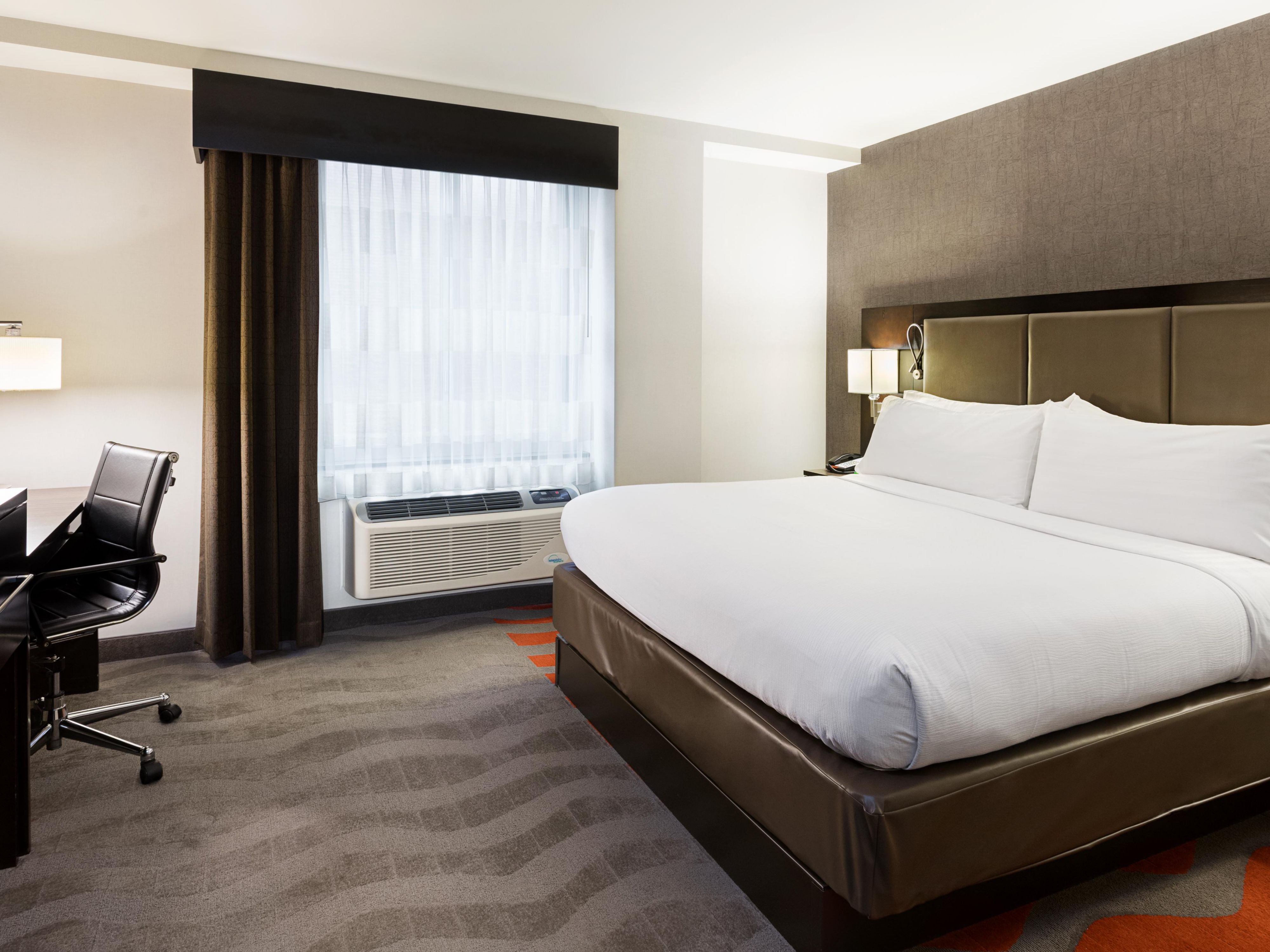 Work comfortably and rest well in your spacious King Guestroom 