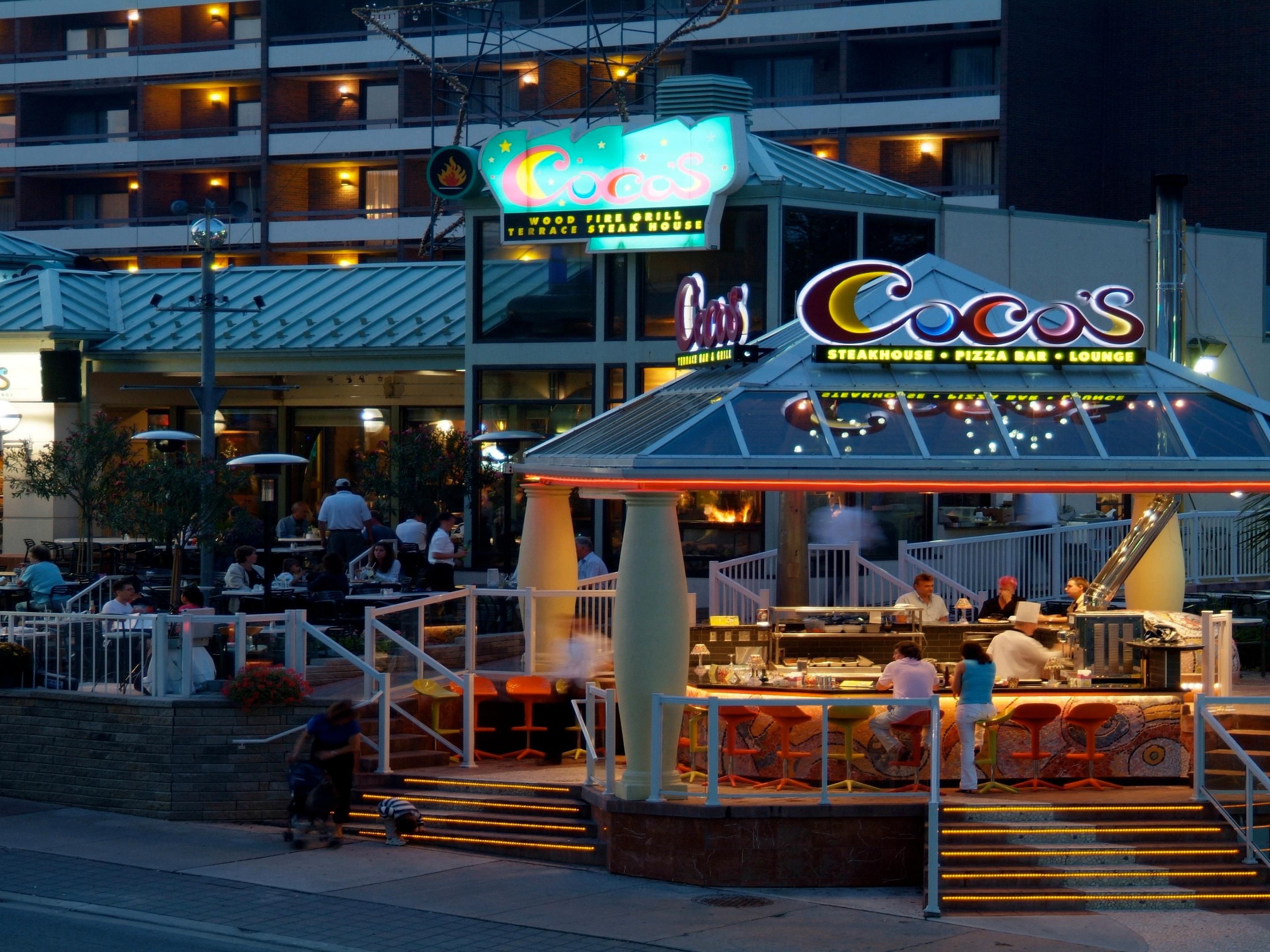 Enjoy gourmet pizza and steaks done to perfection on our wood fired grill & oven. Dine in our beautifully designed and newly-renovated restaurant or under the starlit skies on our patio. Coco's is open for breakfast, lunch and dinner and features nightly entertainment.