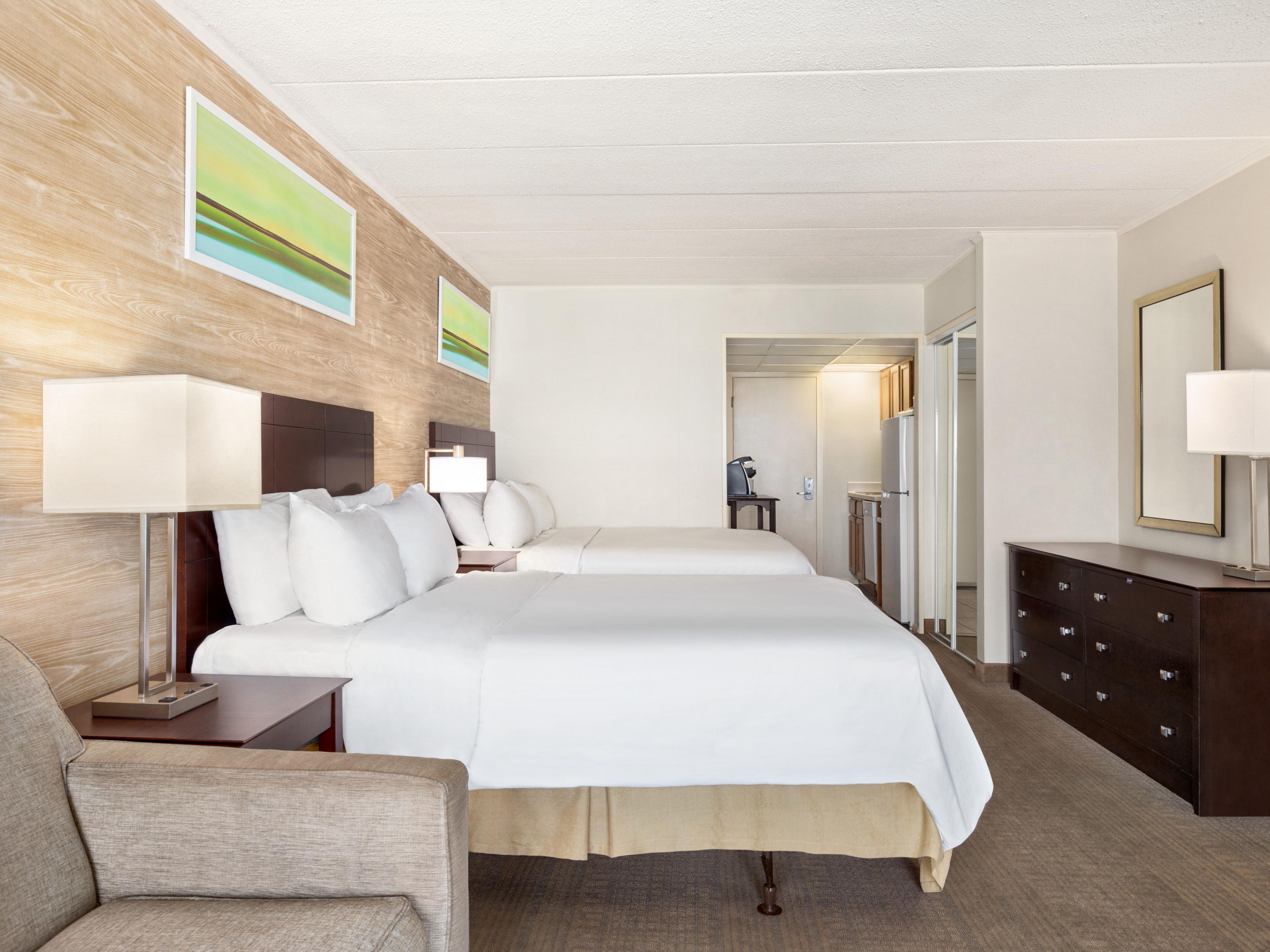 Enjoy the comfort and convenience of our guest rooms with fully equipped kitchenettes and private balconies. Each kitchenette features a microwave, refrigerator, and essential utensils so you can easily prepare snacks and meals. Ideal for extended stays and family fun, enjoy a vacation with a home-like vibe.