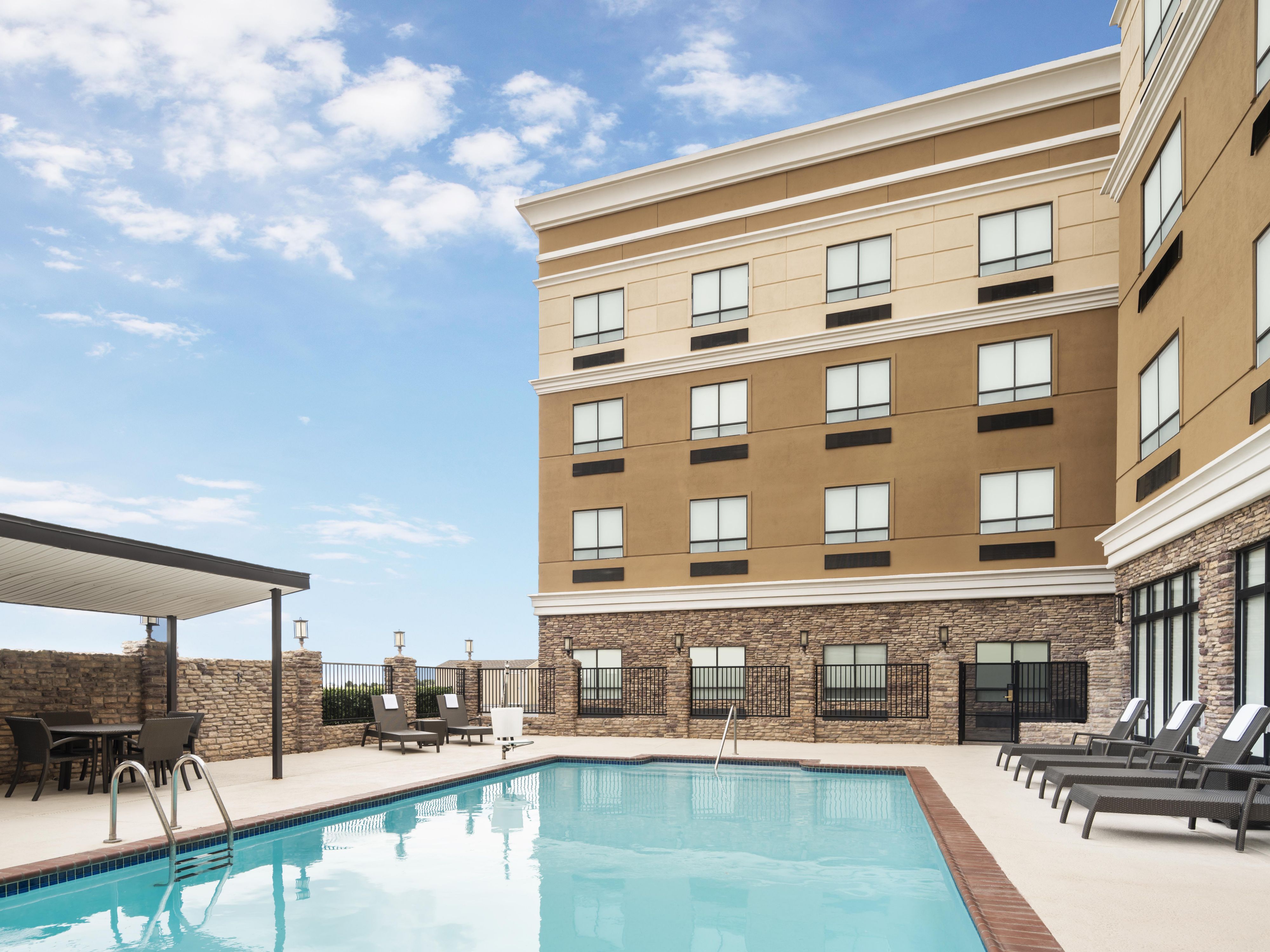Unwind in our outdoor oasis featuring a sparkling pool and patio area. Perfect for relaxing after a long day, our outdoor space provides a tranquil setting to soak up the Texas sun or enjoy an evening under the stars. Open all year long from 9:00 am to 10:00 pm.