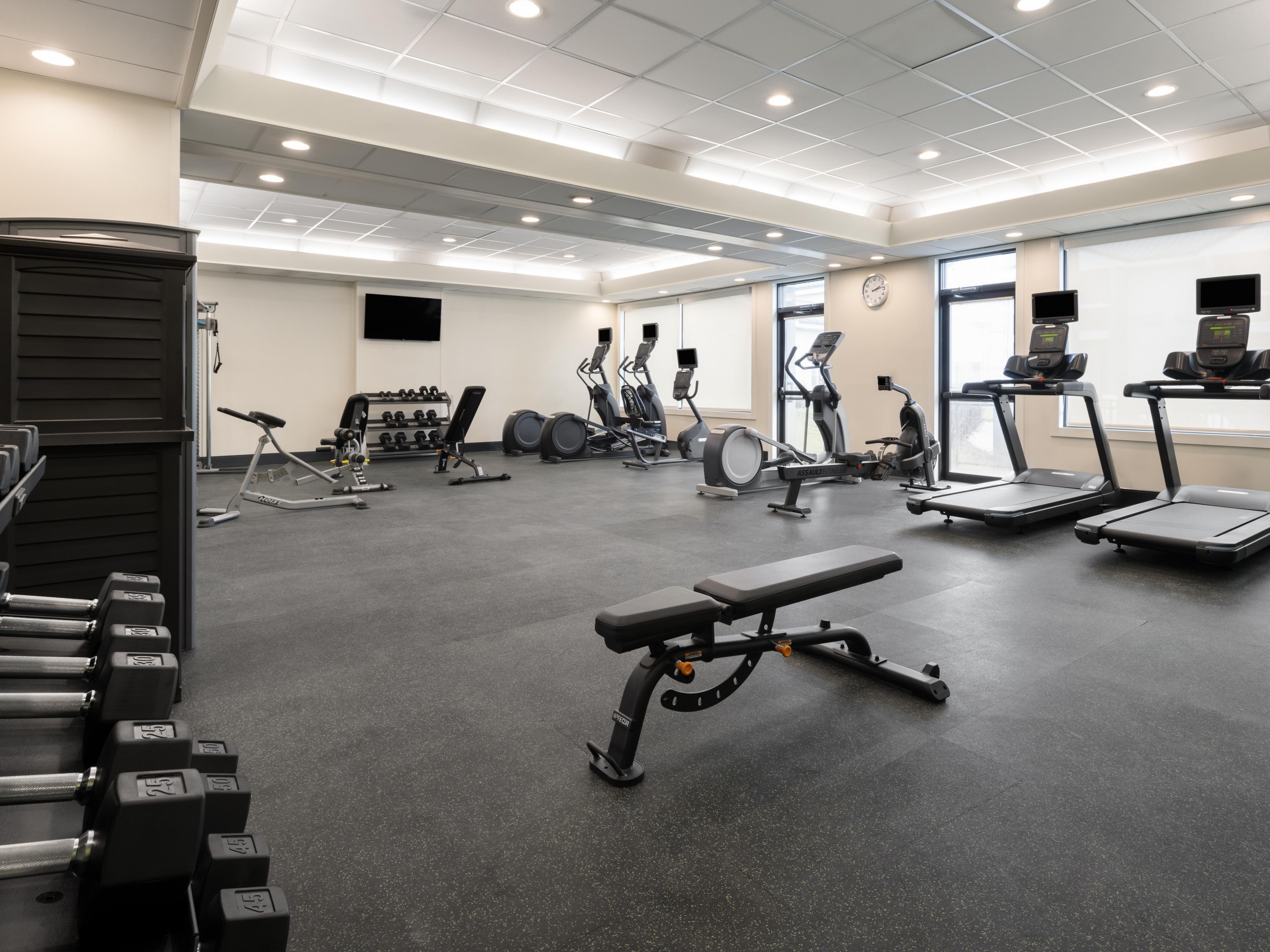 Remain dedicated to your regimen in our comprehensive Fitness Center; rejuvenate in our indoor hot tub, utilize our self-serve laundry facility, maintain productivity in our expansive Business Center, and acquire last-minute snacks, beverages, and gifts at our lobby gift shop. Our seasonal outdoor pool is set to reopen in May 2025.