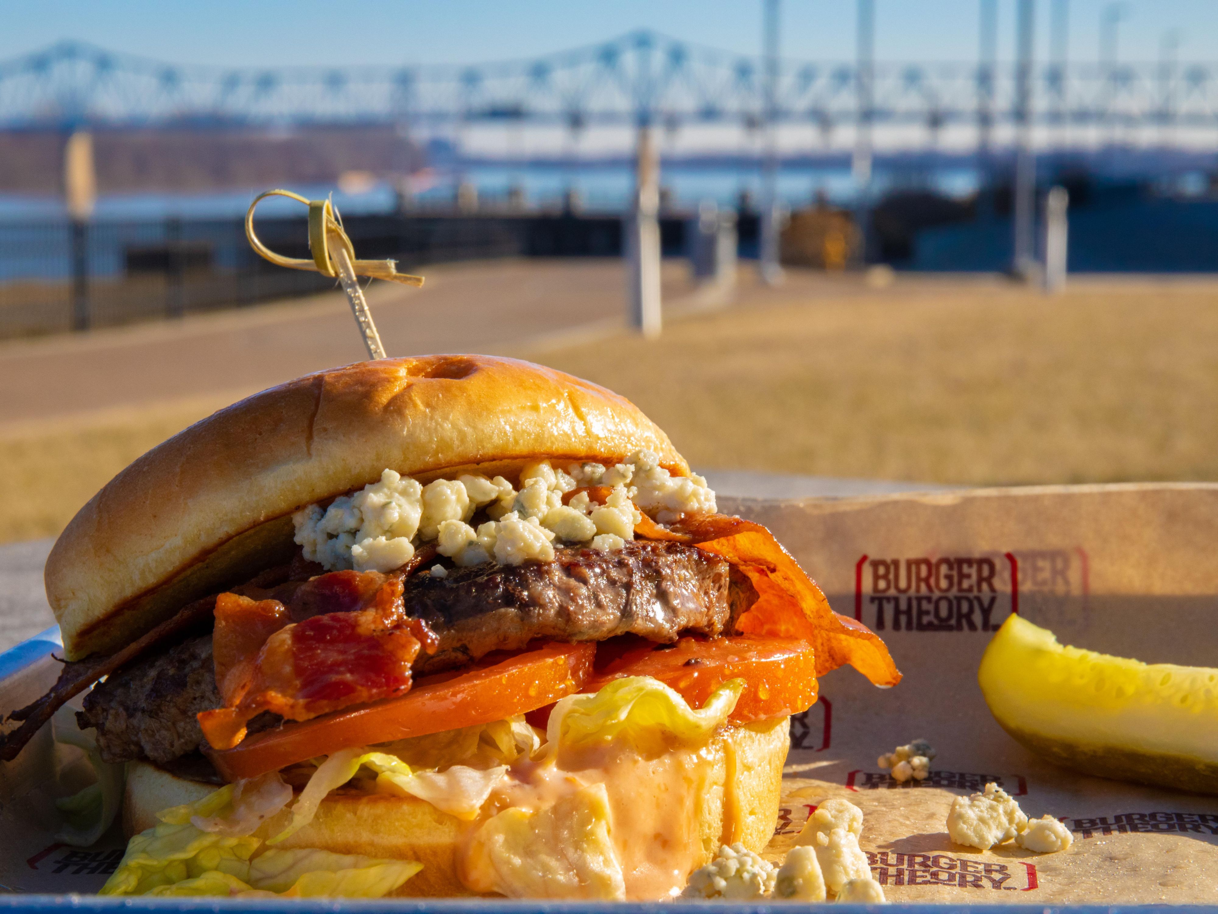 Savor mouthwatering burgers, crisp salads, and crave-worthy appetizers at Burger Theory, our on-site restaurant. Customize your perfect burger with a variety of fresh toppings, and pair it with a local draft or cocktail from the full bar. Whether you're dining solo or with family, it's the perfect place to unwind and enjoy a delicious meal.
