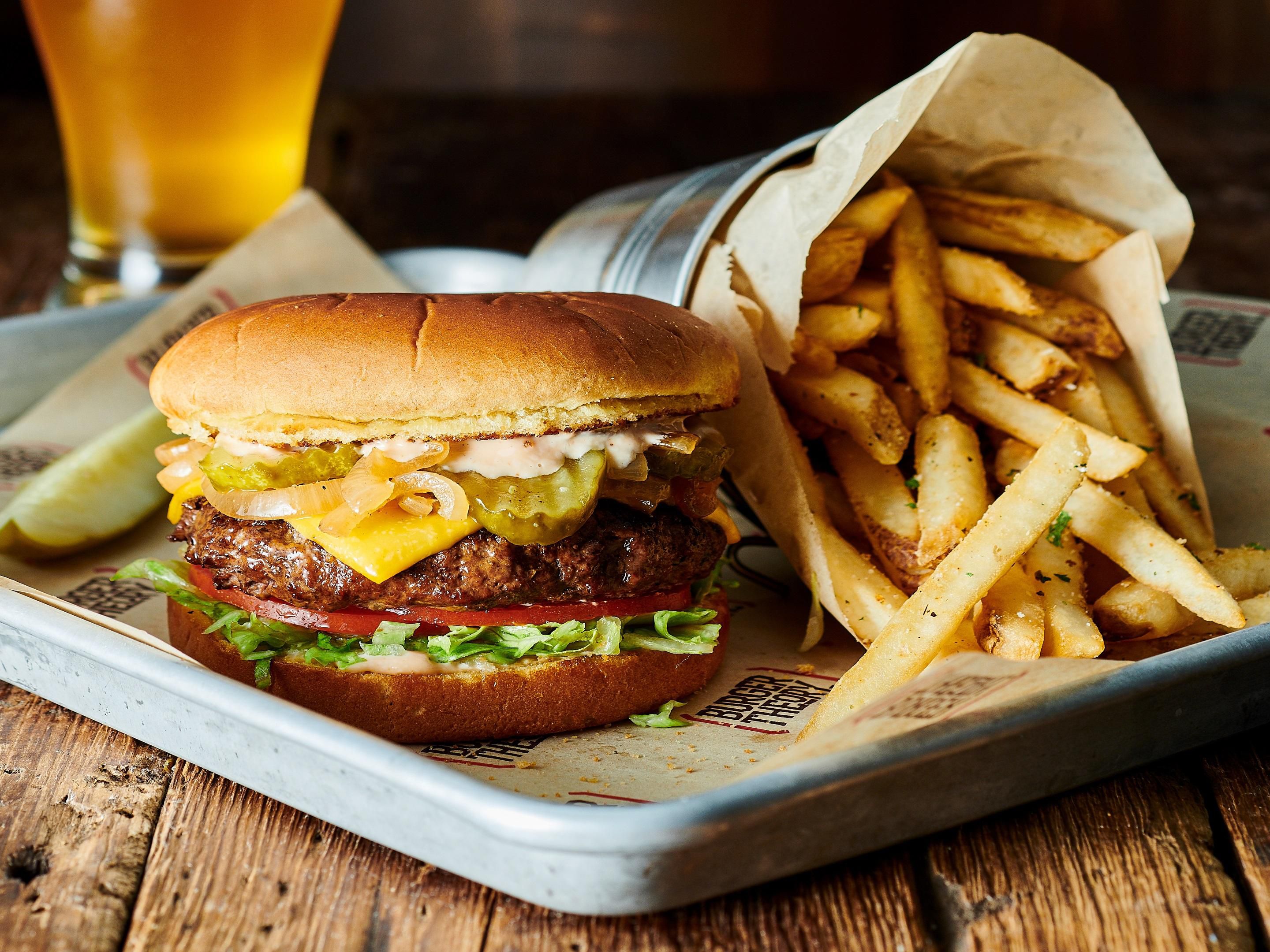 Savor mouthwatering burgers, crisp salads, and crave-worthy appetizers at Burger Theory, our on-site restaurant. Customize your perfect burger with a variety of fresh toppings, and pair it with a local draft or cocktail from the full bar. Whether you're dining solo or with family, it's the perfect place to unwind and enjoy a delicious meal.