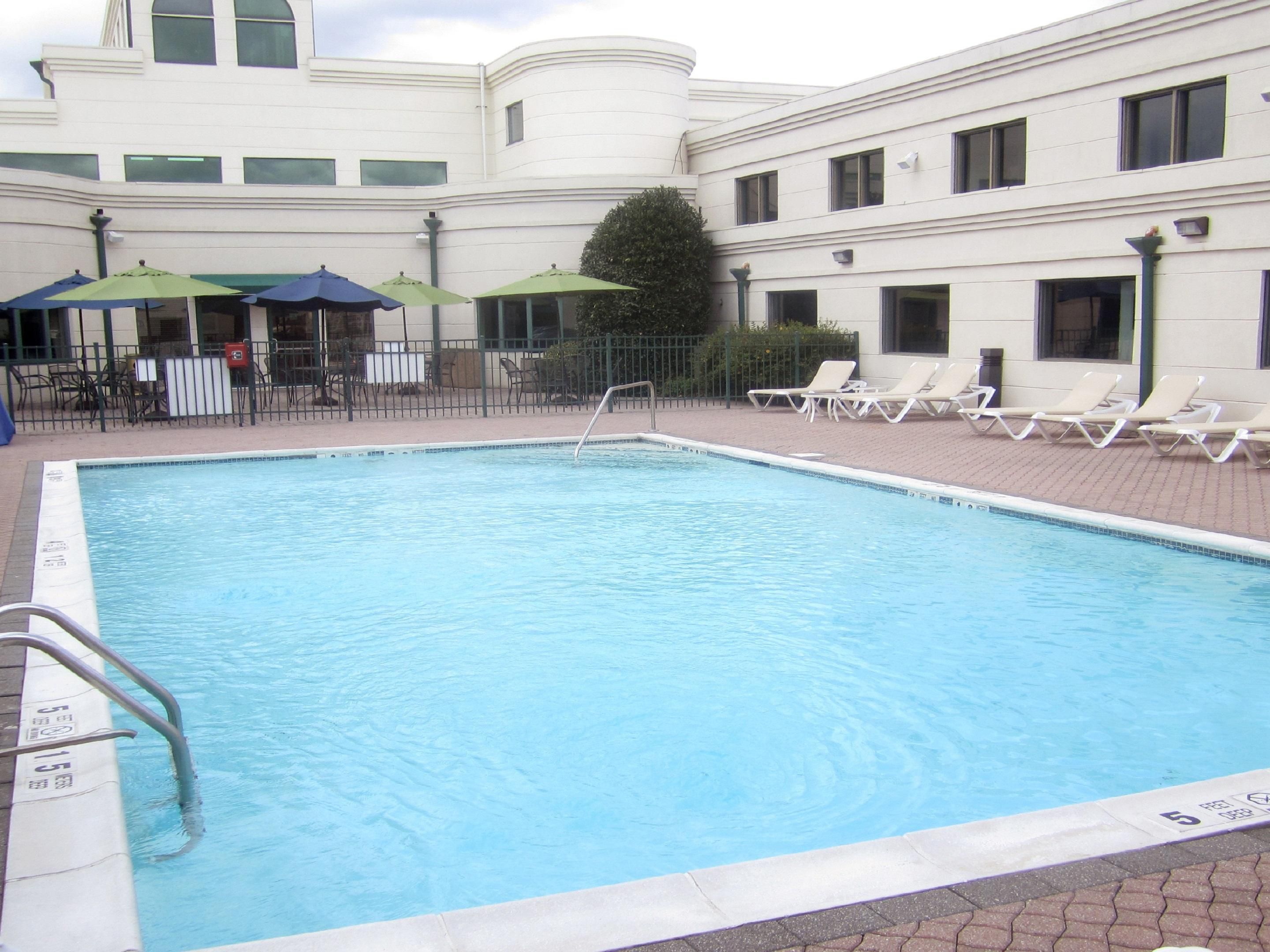 Our hotel near Melville, NY, offers a range of amenities to ensure a comfortable stay. Take a dip in our outdoor pool, enjoy free Wi-Fi and complimentary parking, and stay active in our 24-hour fitness center. Plus, dine onsite and get work done at our business center. All designed for your convenience, your home away from home.