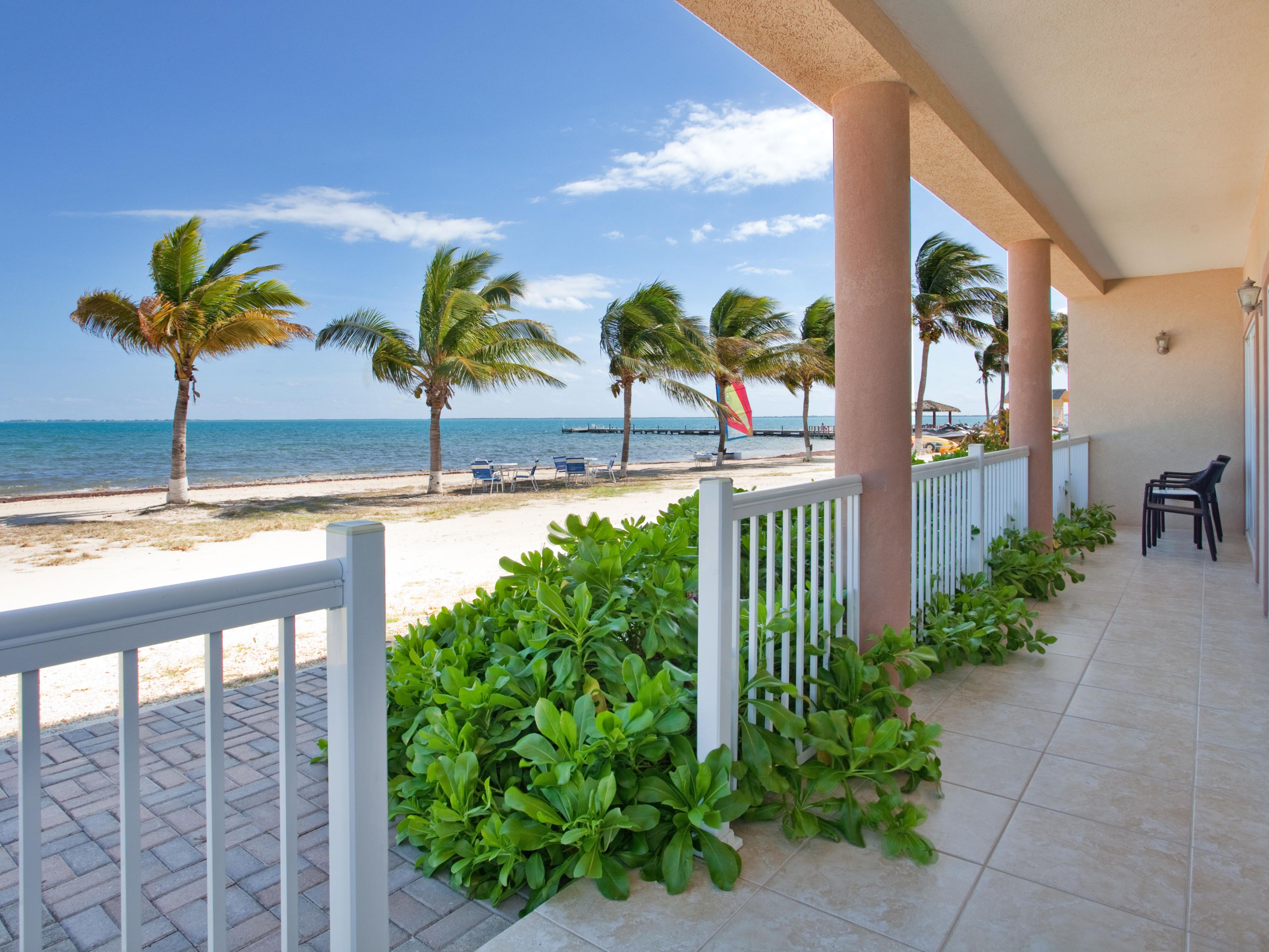 Among the largest accommodations in Grand Cayman, our four spacious 1,584 sq. ft. 2-bedroom Grand Villas feature a master suite with a king bed and en suite bath, a second bedroom with a queen bed and en suite bath, a dining room, living room with sleeper sofa, full kitchen with dishwasher, laundry room with washer and dryer plus a private balcony.