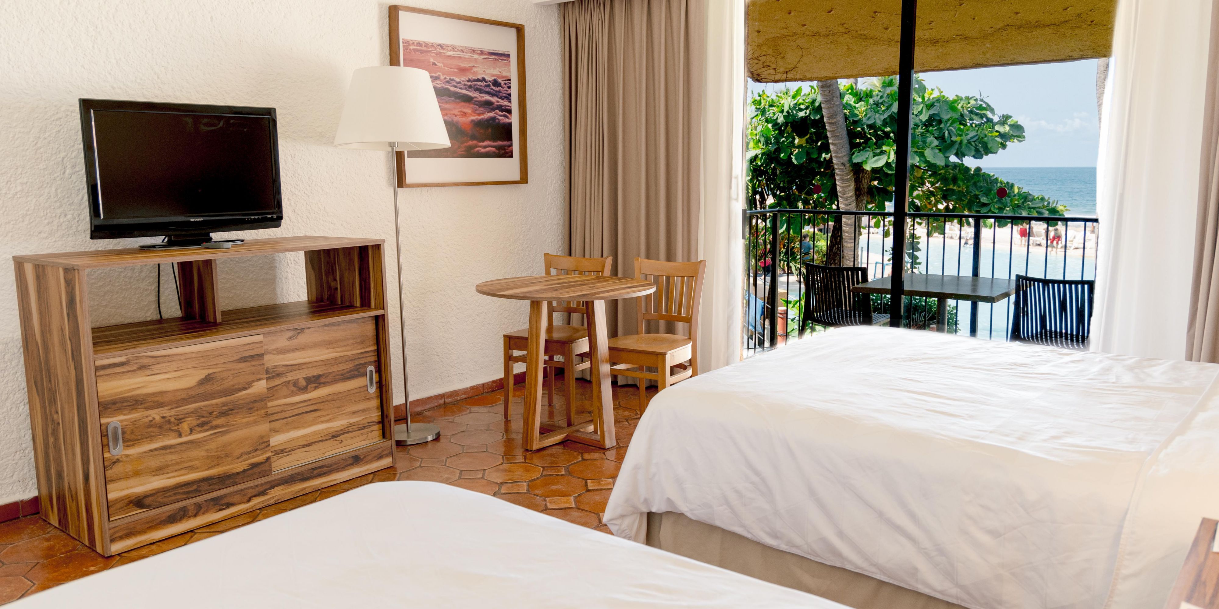 Exquisite Room with Pool View at Ixtapa Hotels on the beach.