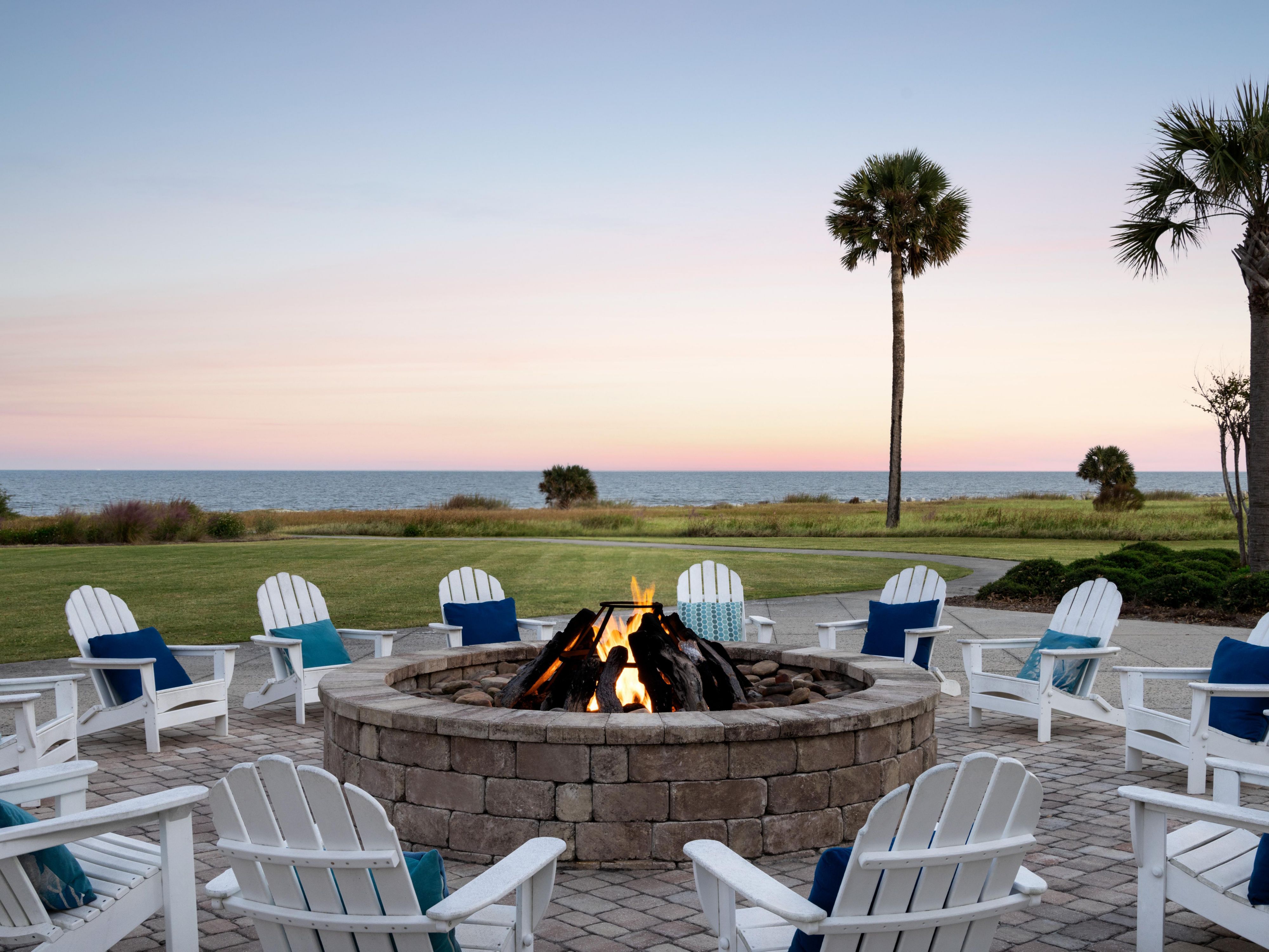 Outdoor firepits with chairs around