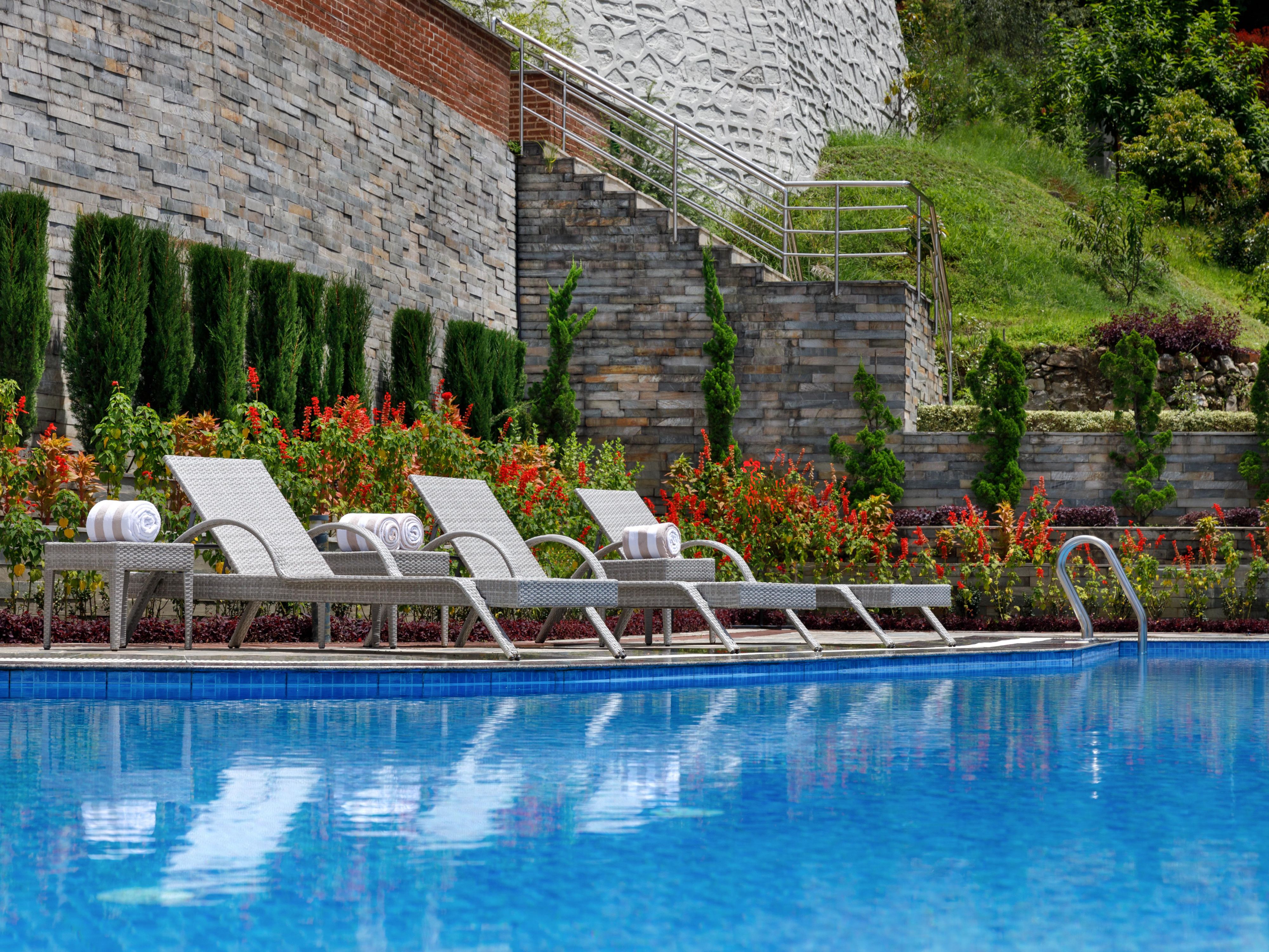 Soak in the sun and take in the scenic views from our outdoor pool, the perfect spot for relaxation and unwinding.