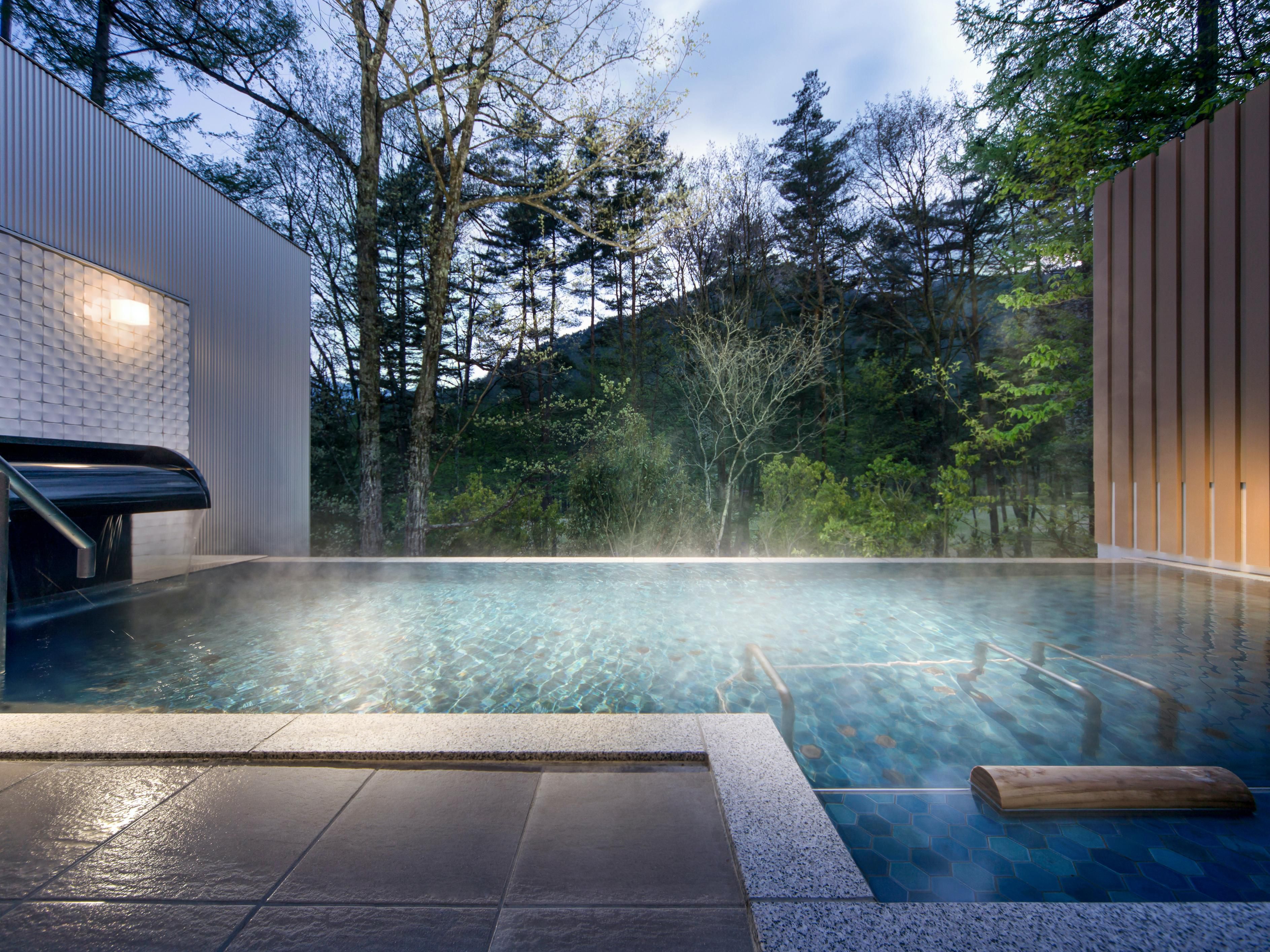 Take a long soak in our open-air bath nestled among the trees and let the mineral-rich natural Onsen water from Kuzu Onsen rejuvenate and relax you.
By day, sunlight filters through the surrounding trees, and as the daylight fades, sunset over the Northern Alps is followed by clear nights with perfect star-gazing conditions.