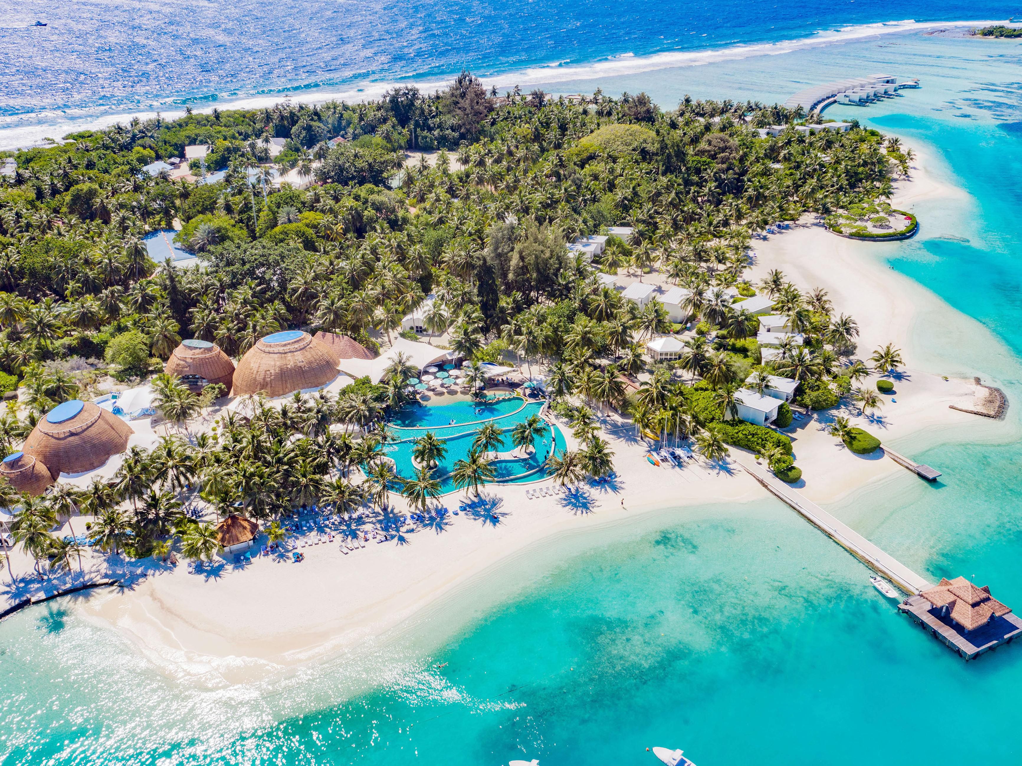 Beach chairs around a fire pit