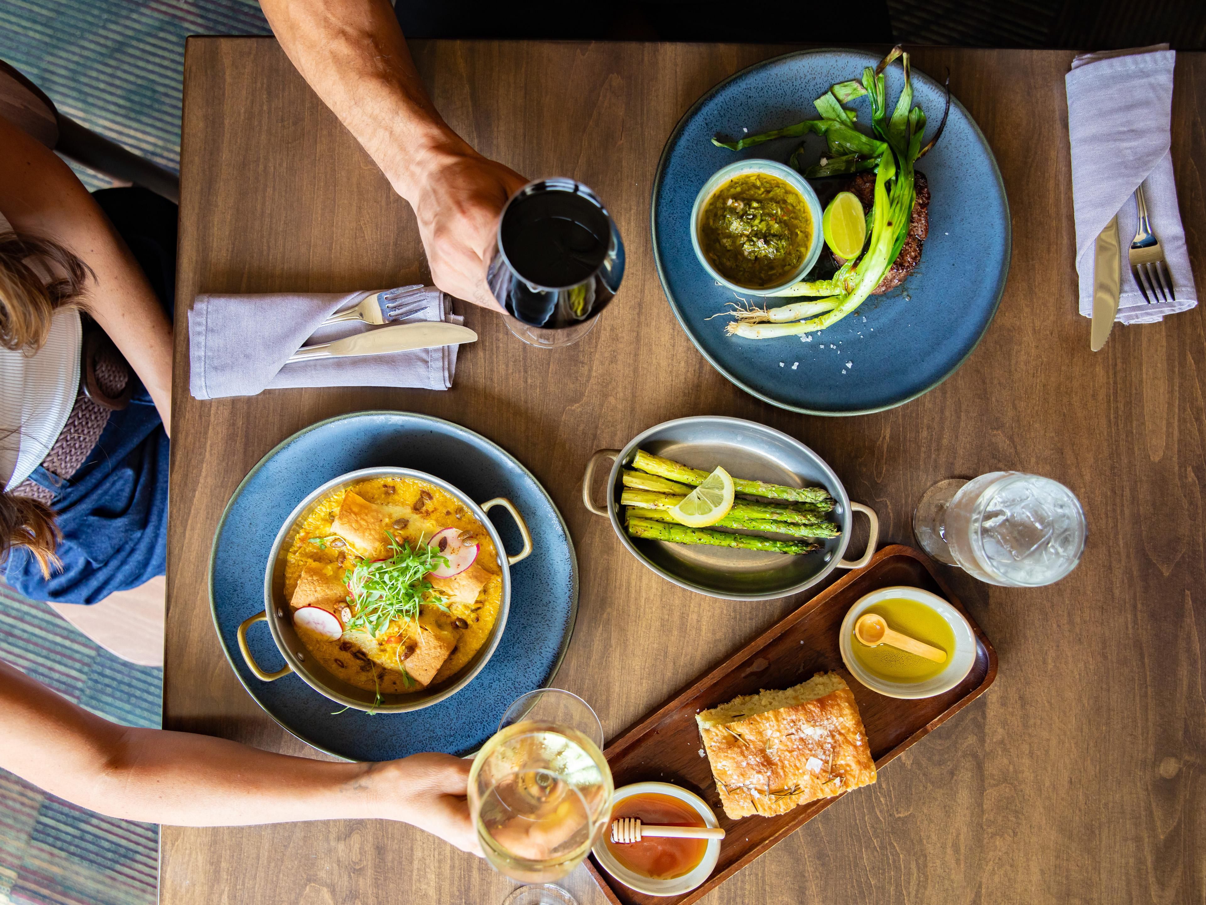 Enjoy four fantastic dining options! Start with a hearty breakfast at Canyon Room, savor upscale dinners at Desert Lounge + Grill, grab pub favorites at Squire Pub + Social, or relax with poolside bites at Watchtower Pool + Patio. Diverse menus and great convenience make every meal special. Please note some of our restaurants close seasonally.