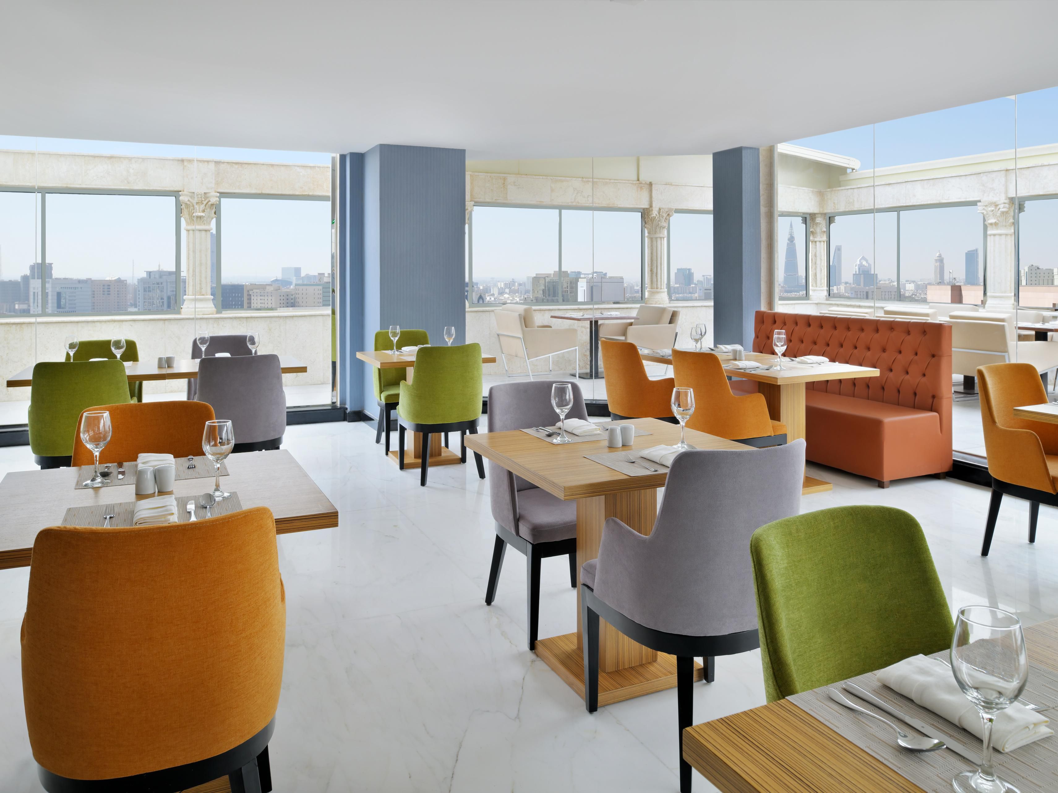 Dine at Sky Lounge, a family-friendly restaurant offering a fusion of Levantine and international cuisine. Enjoy a relaxed atmosphere with comfortable seating, perfect for gatherings over a hearty meal. Savour delicious dishes crafted with fresh ingredients and exceptional service, creating memorable moments of satisfaction.