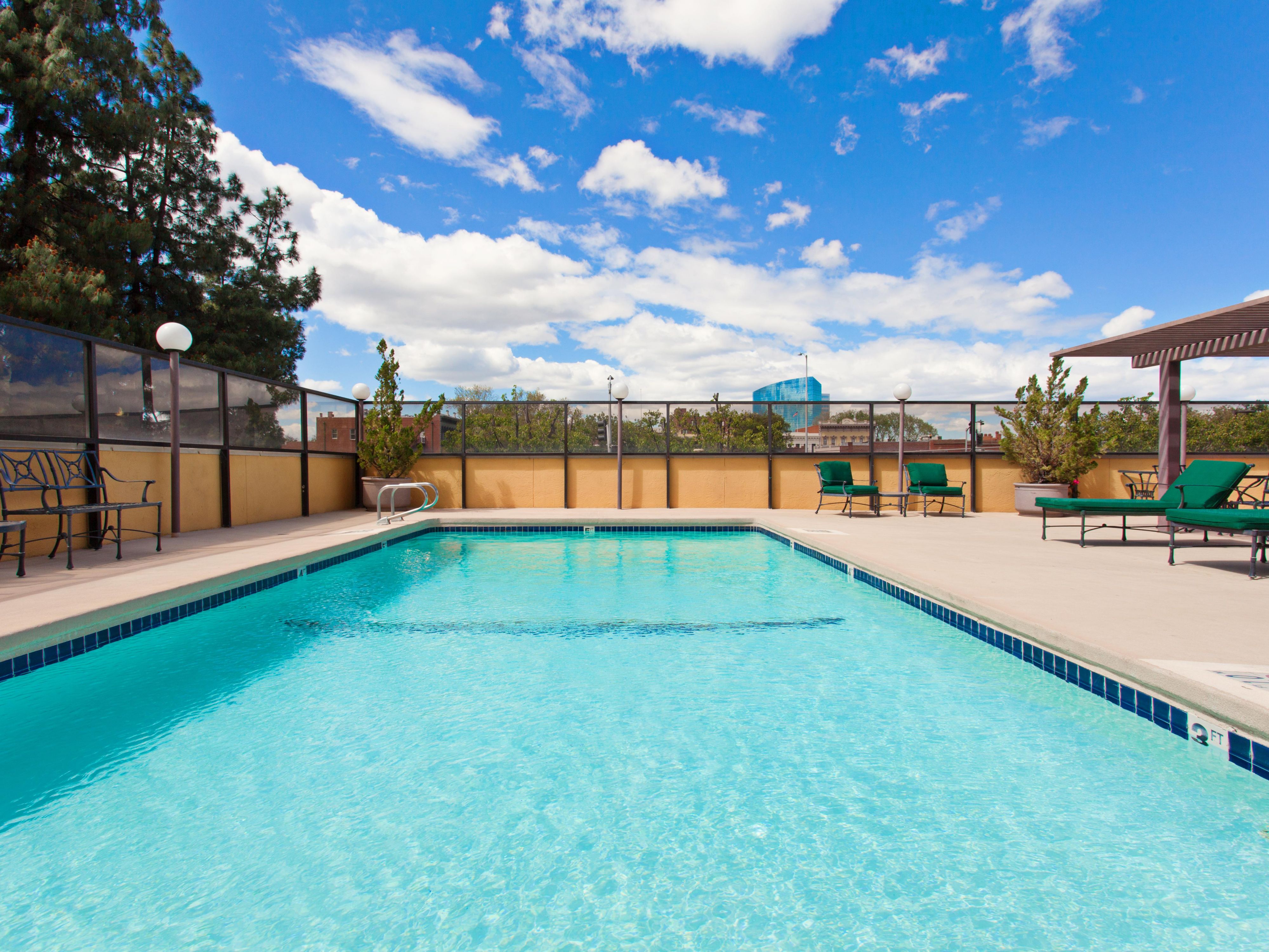 machines, a recumbent bike, free weights, and a balance ball