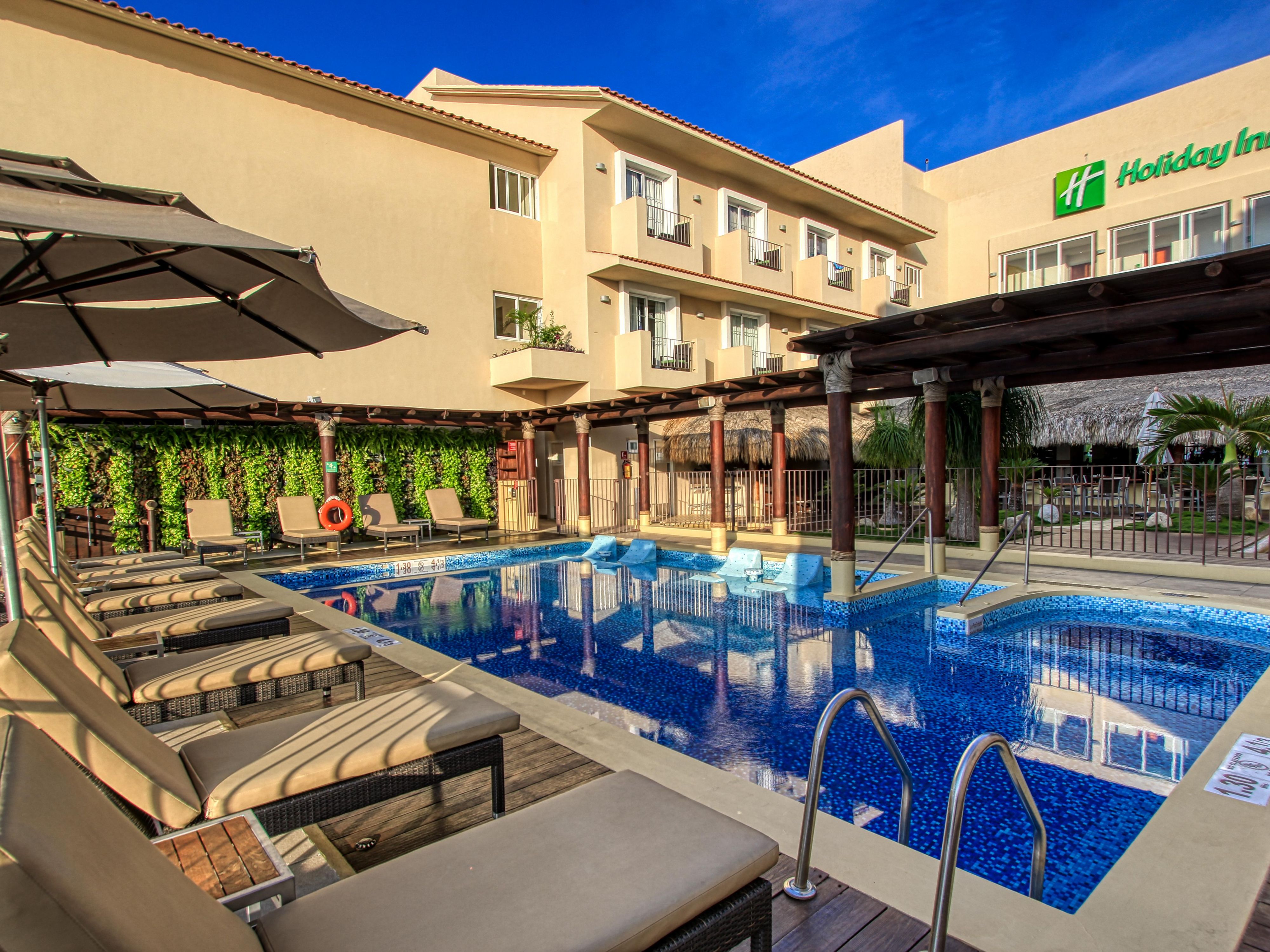 Relax in the sunshine and cool off in the swimming pool.