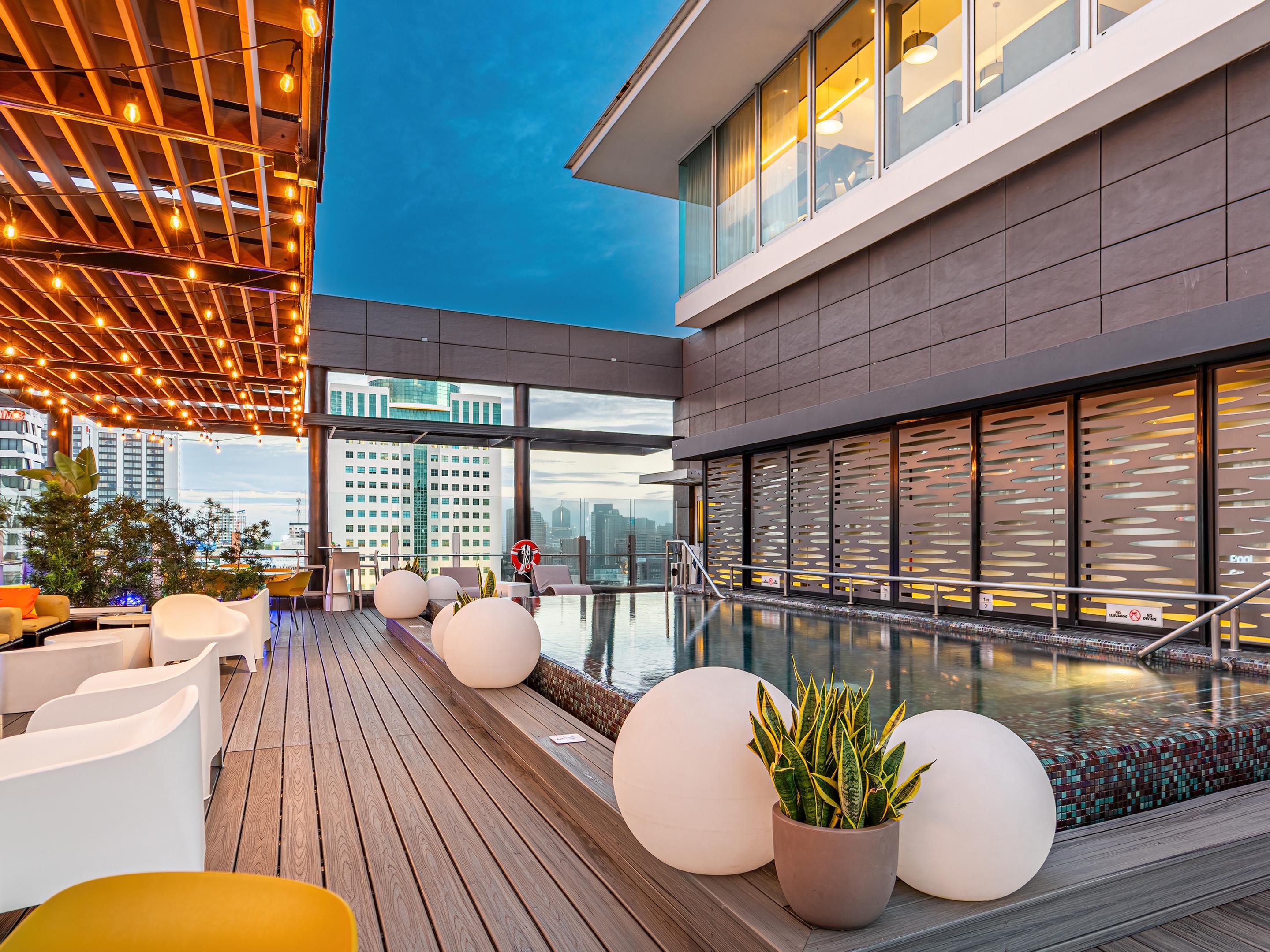 Plunge into fun at our outdoor rooftop pool! Surrounded by cozy loungers and scenic views, our rooftop pool is the ultimate spot to soak up the sun, enjoy a refreshing swim, or simply chill out with a cool drink in hand. Make a splash and embrace the vacation vibes!
