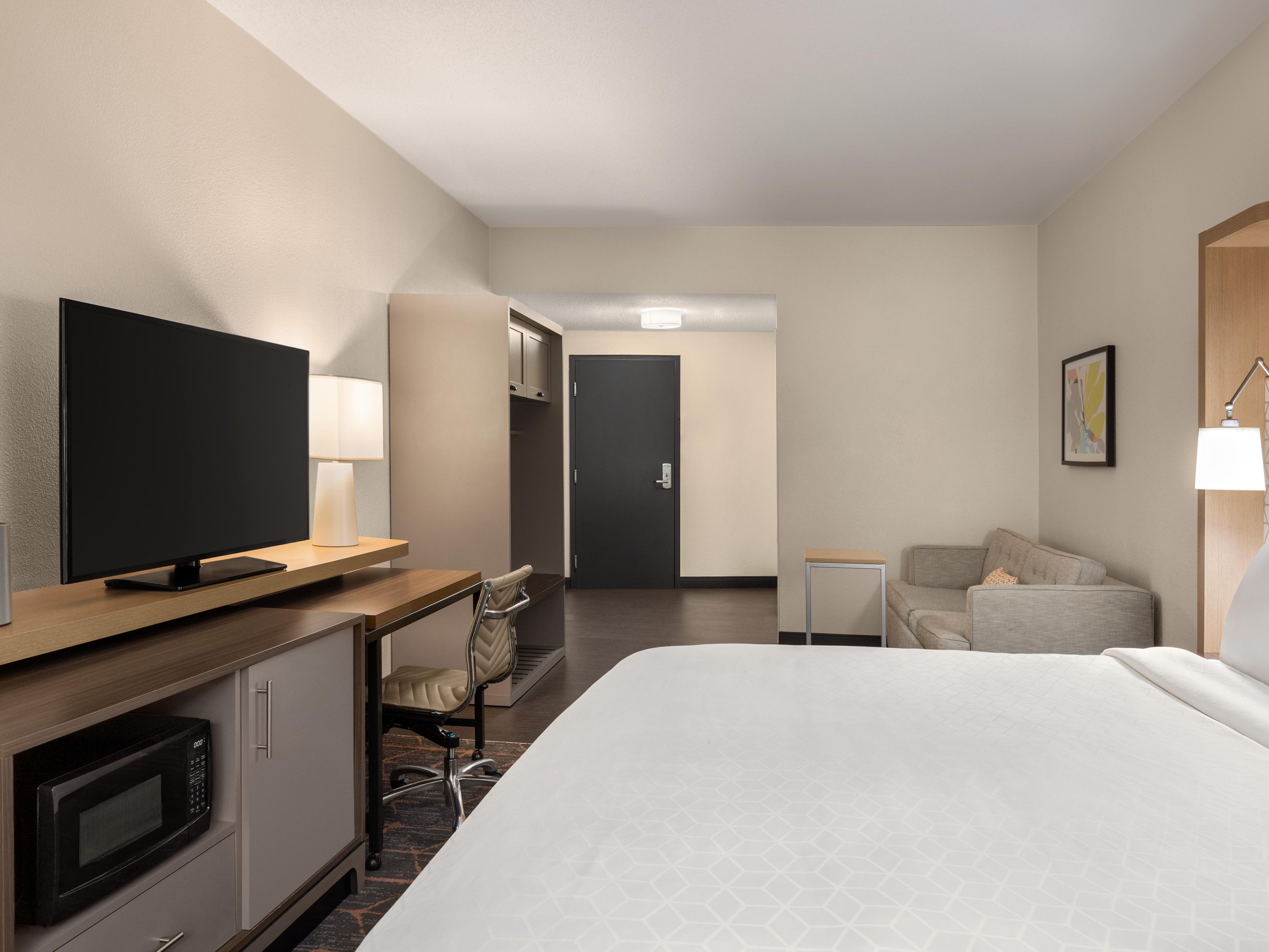 Relax and unwind in king premium with sofa bed.