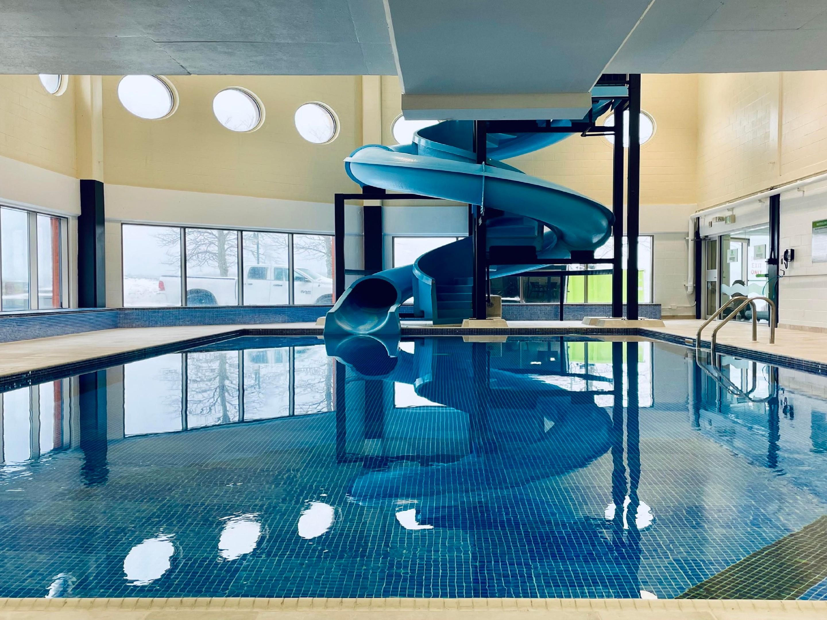 Make a splash in our indoor pool with waterslide and whirlpool.