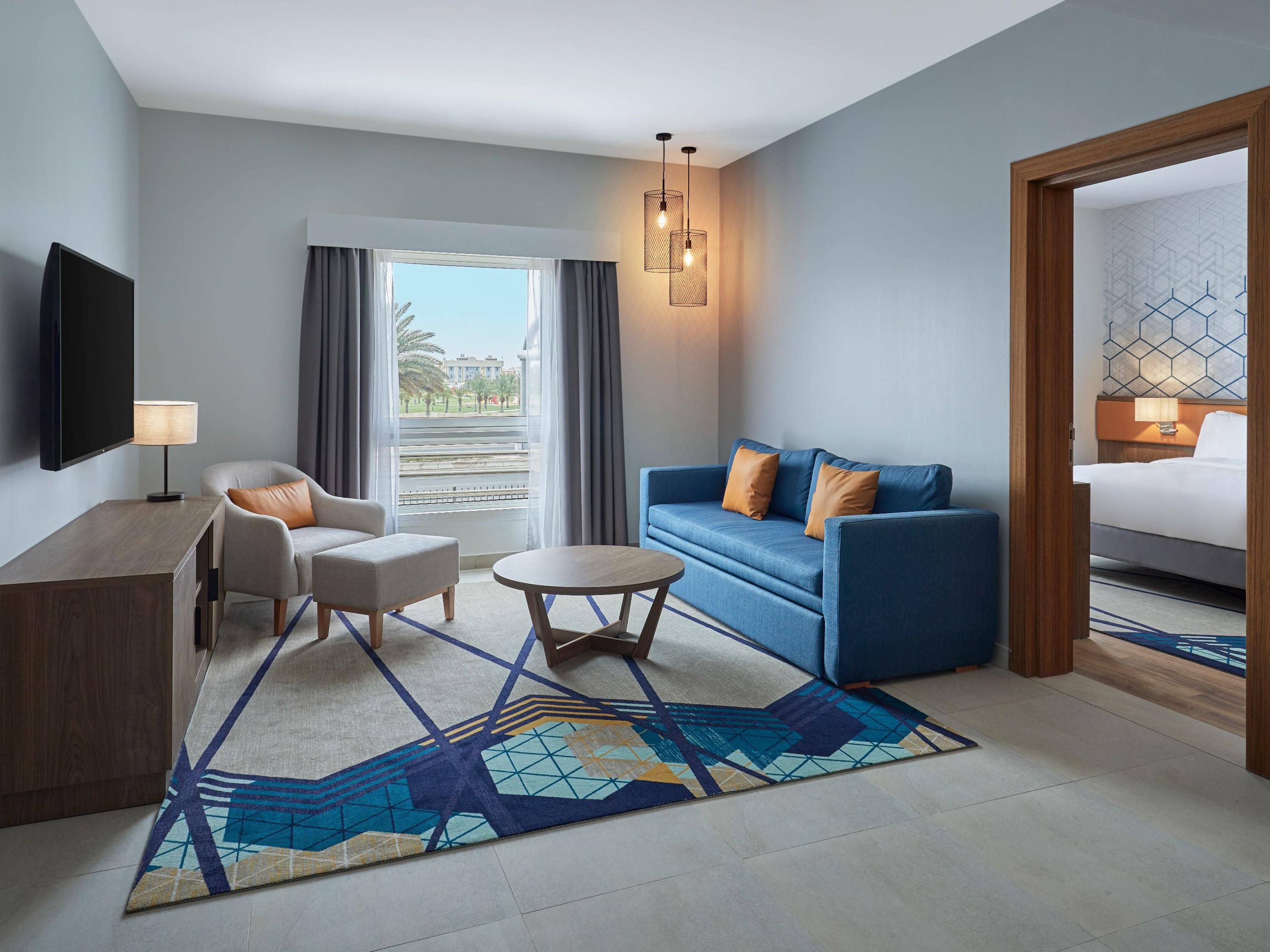 Our elegantly designed suites are the perfect place to reward yourself and get away for a relaxing stay with your loved ones.  Spacious living room and plush bedding with modern amenities