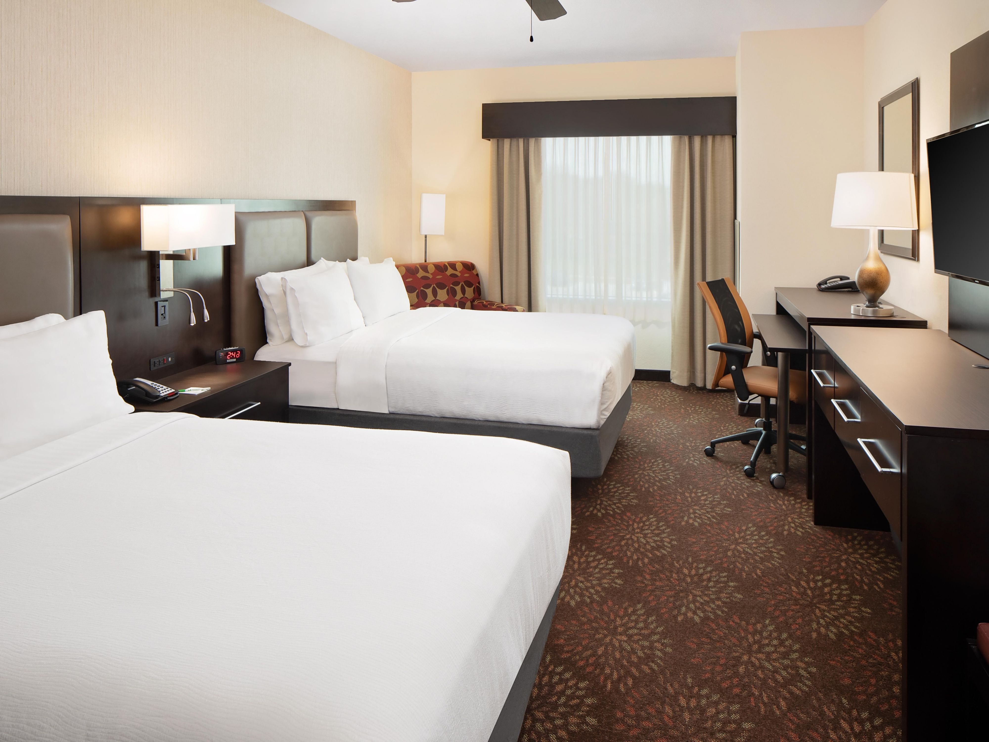 Upgrade to our King or One-Bedroom suites for extra space and a separate living area with a comfy couch. Enjoy a productive stay with room to work, relax, and stretch out, balancing comfort with functionality for the best of both worlds. Upgrade to the suite life!