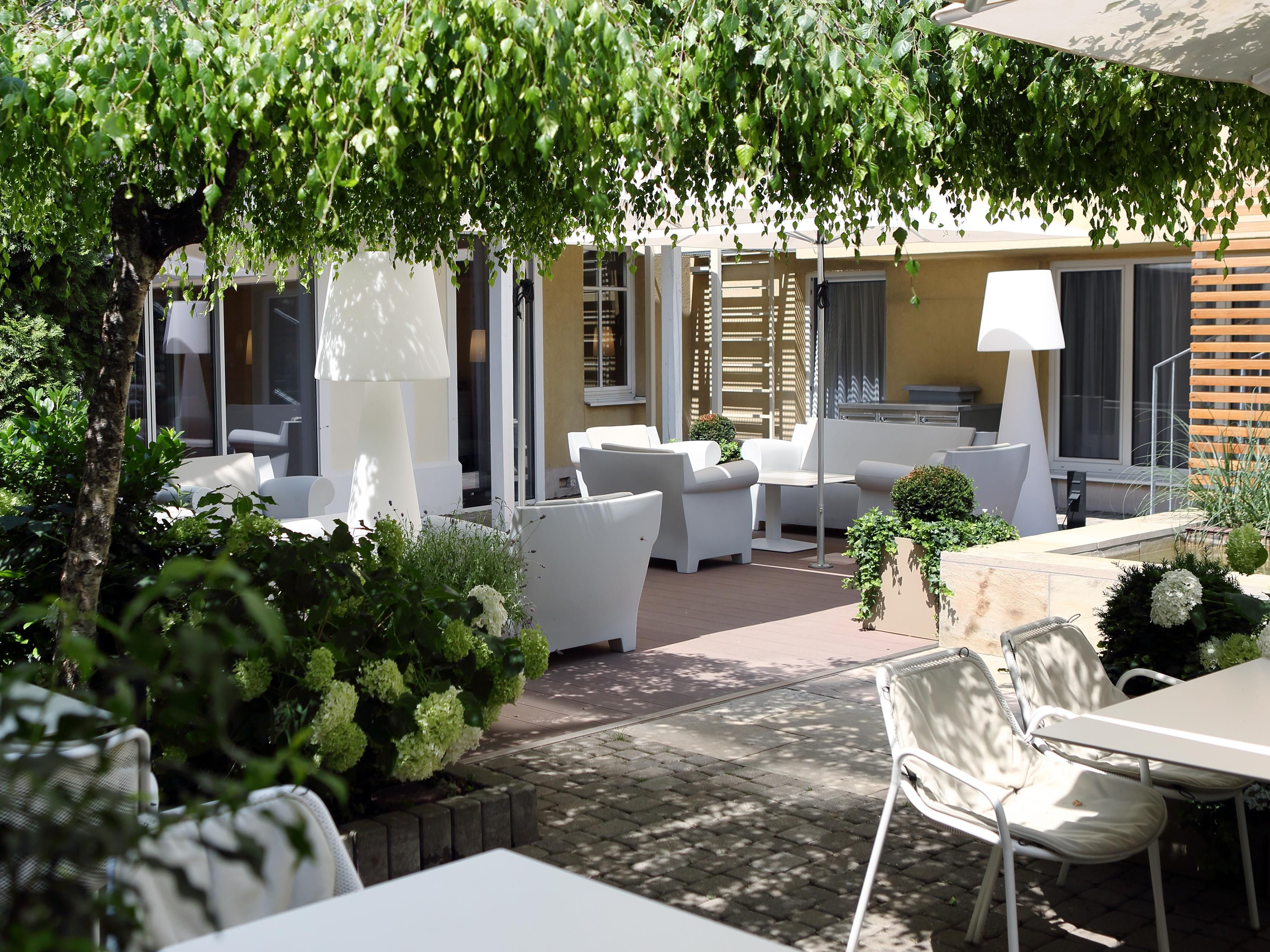 Enjoy your breakfast in our peaceful hotel garden or relax after a day in the city.