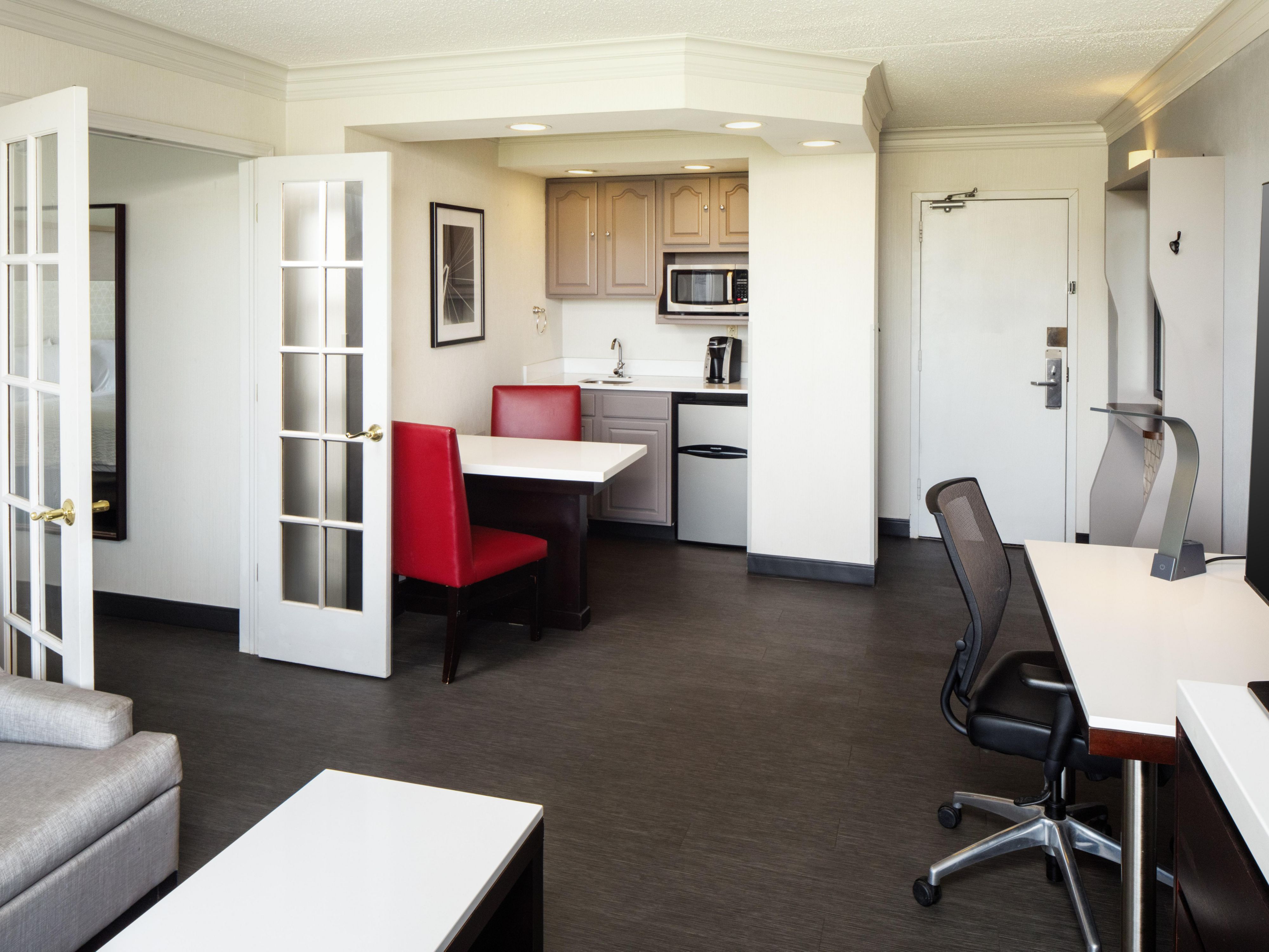 Elevate your stay when you upgrade to one of our special King Suites. Our suites add additional comfort to include a living room area with a sleeper sofa along with a kitchenette. 