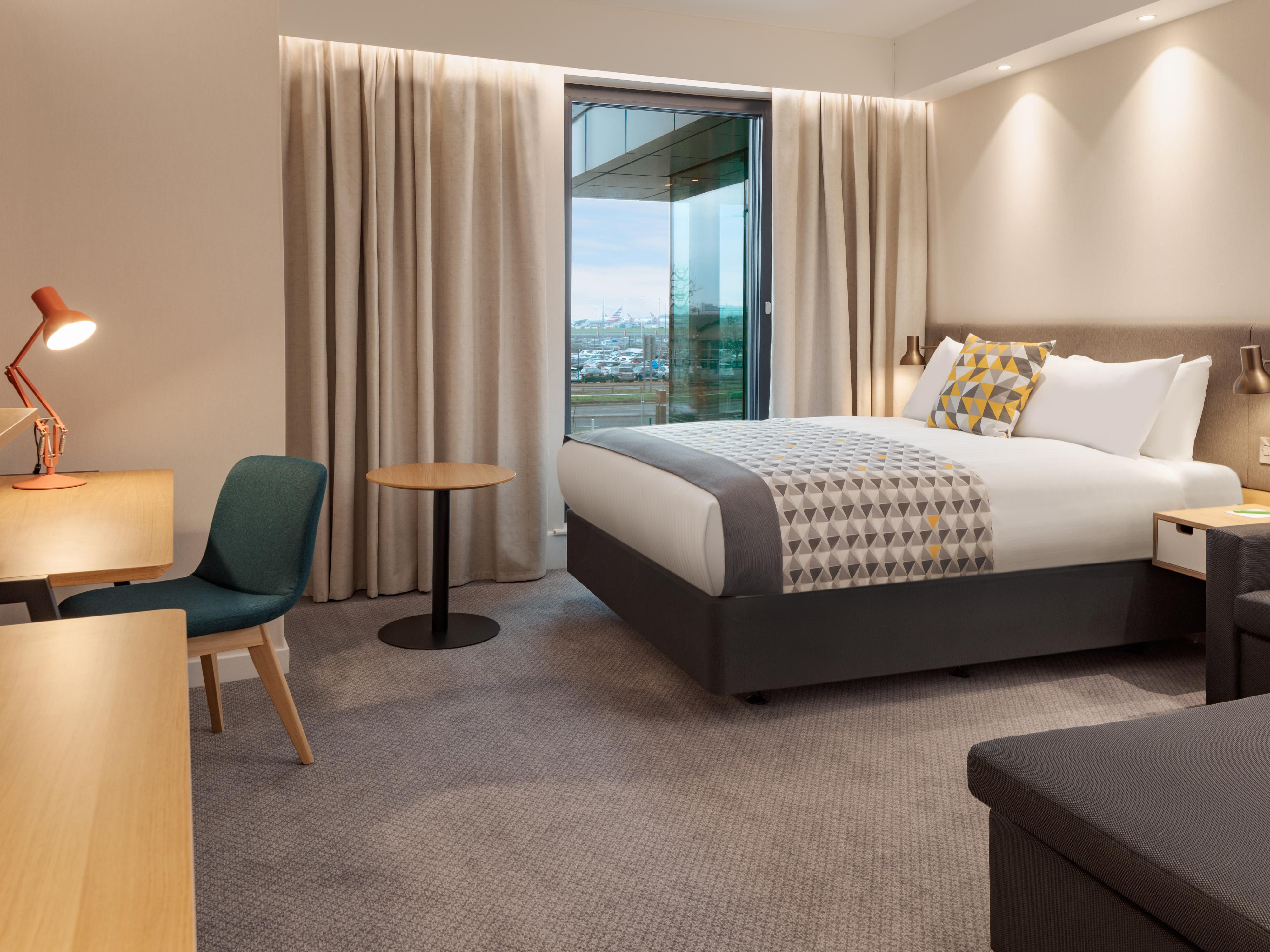 Standard room with comfortable sofa seating area