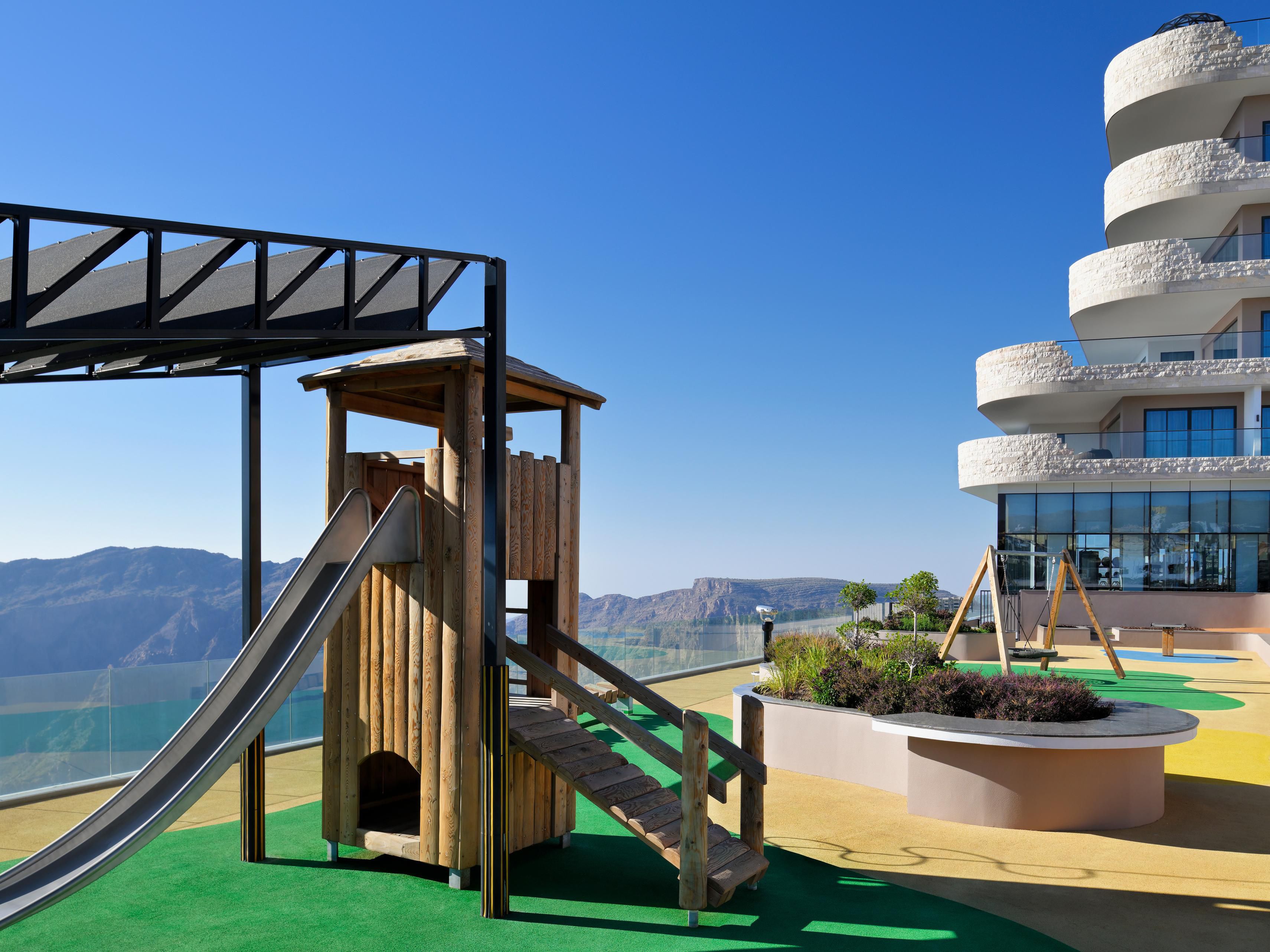 Unleash your child's creativity with fun-filled activities like bracelet-making, origami, coloring, and DIY crafts. Keep the excitement going with Jenga, Tic Tac Toe, and scavenger hunts. At Hotel Indigo Jabal Akhdar, kids love the outdoor play zone and family-friendly pool. They enjoy new activities every day with our rotating in-house program.
