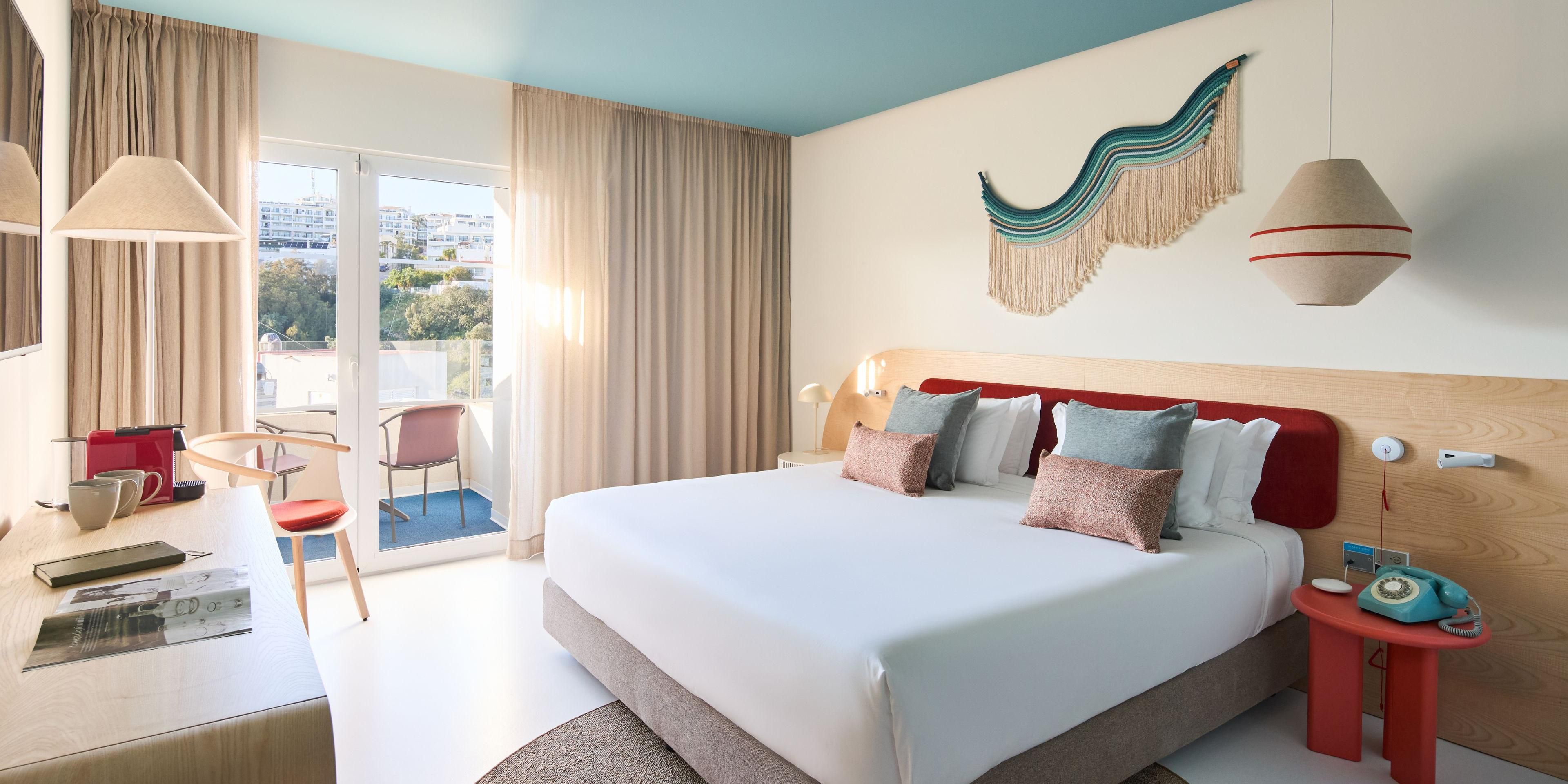 Accessible King Room with pool view and balcony