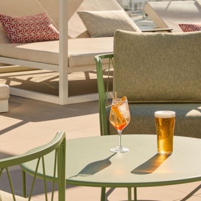 Enjoy a refreshing cocktail by the swimming pool