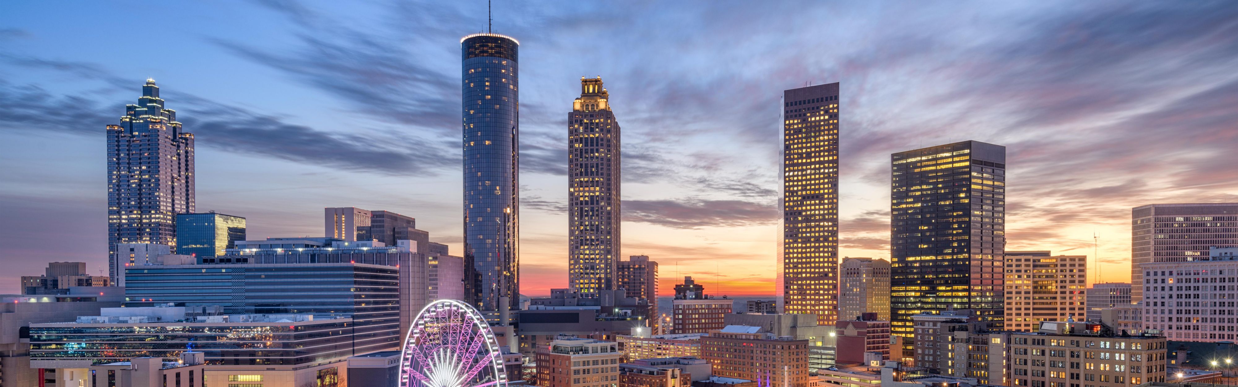 Atlanta's skyline sparkles at night as a beacon of urban charm.