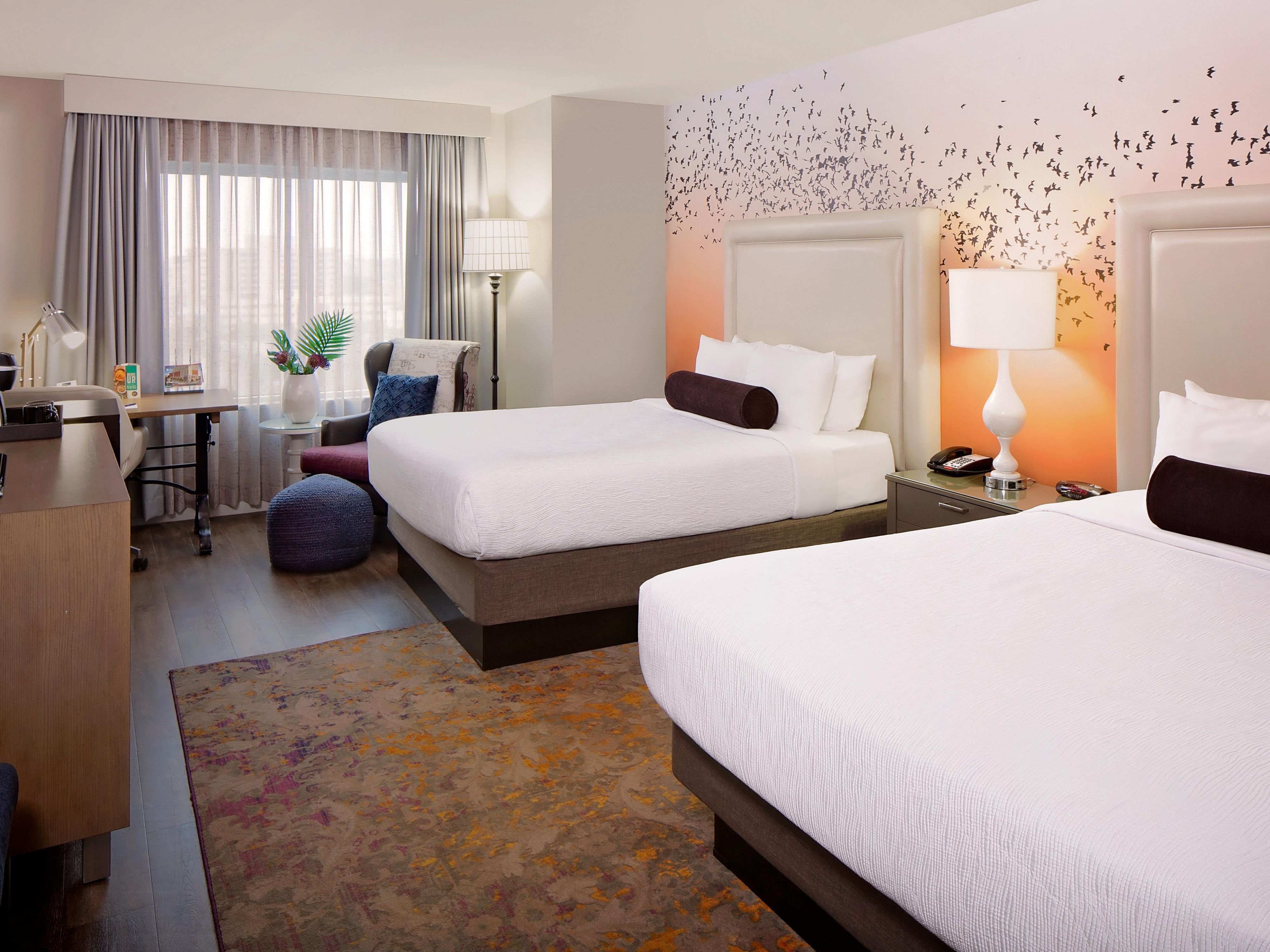 Hotel Indigo Austin allows pets with a one-time fee of $75 per stay. Up to two pets per room, with a size limit of 75 pounds. The hotel also has designated areas for pets.