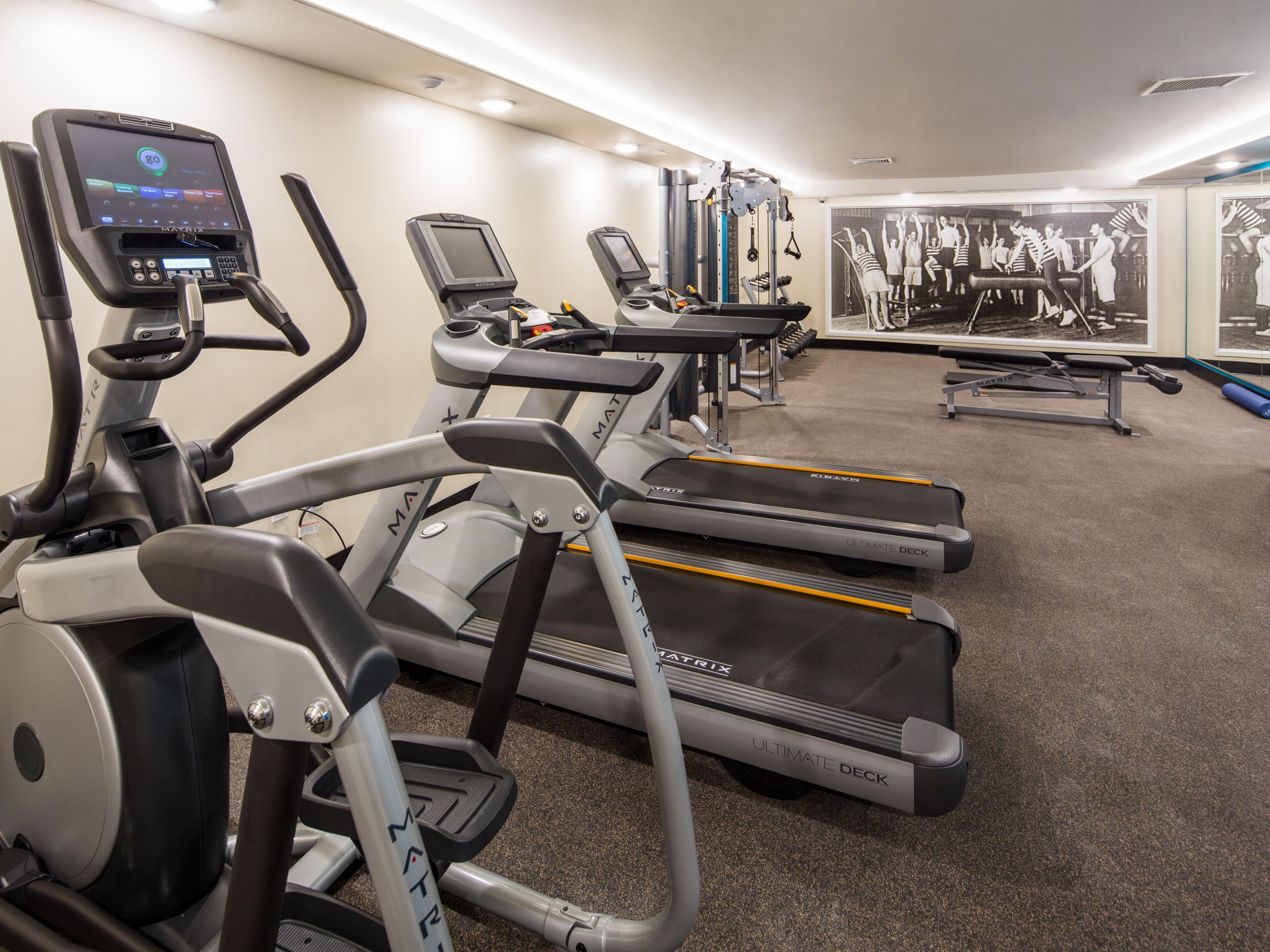 Maintain your healthy routine while away from home in our modern Fitness Center located off the main lobby for your convenience. Stay active and energized in our 24-hour gym, designed with cardio and training equipment for a total body workout and windows with natural light.