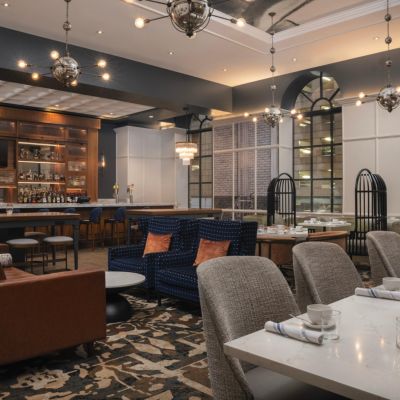 Join us at Poets Modern Cocktails and Eats during your stay