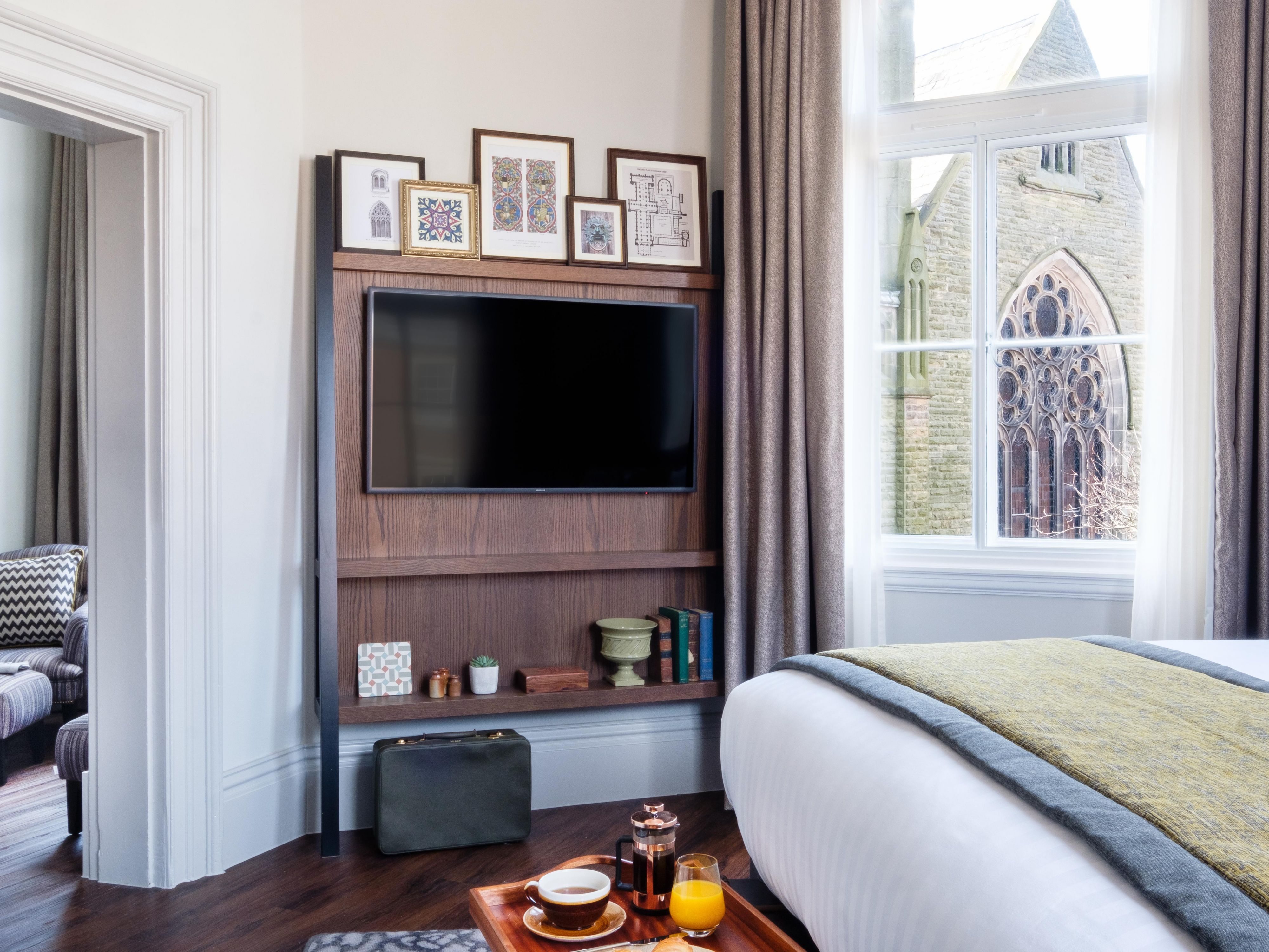 We offer guests boutique hotel rooms that blend modern comfort with the building's historic charm, fitted with plush bedding and spa-inspired bathrooms. The hotel's unique design is reflected through our rooms, paying homage to the buildings Durham heritage. Our suites offer stunning views of some of iconic Durham landmarks.