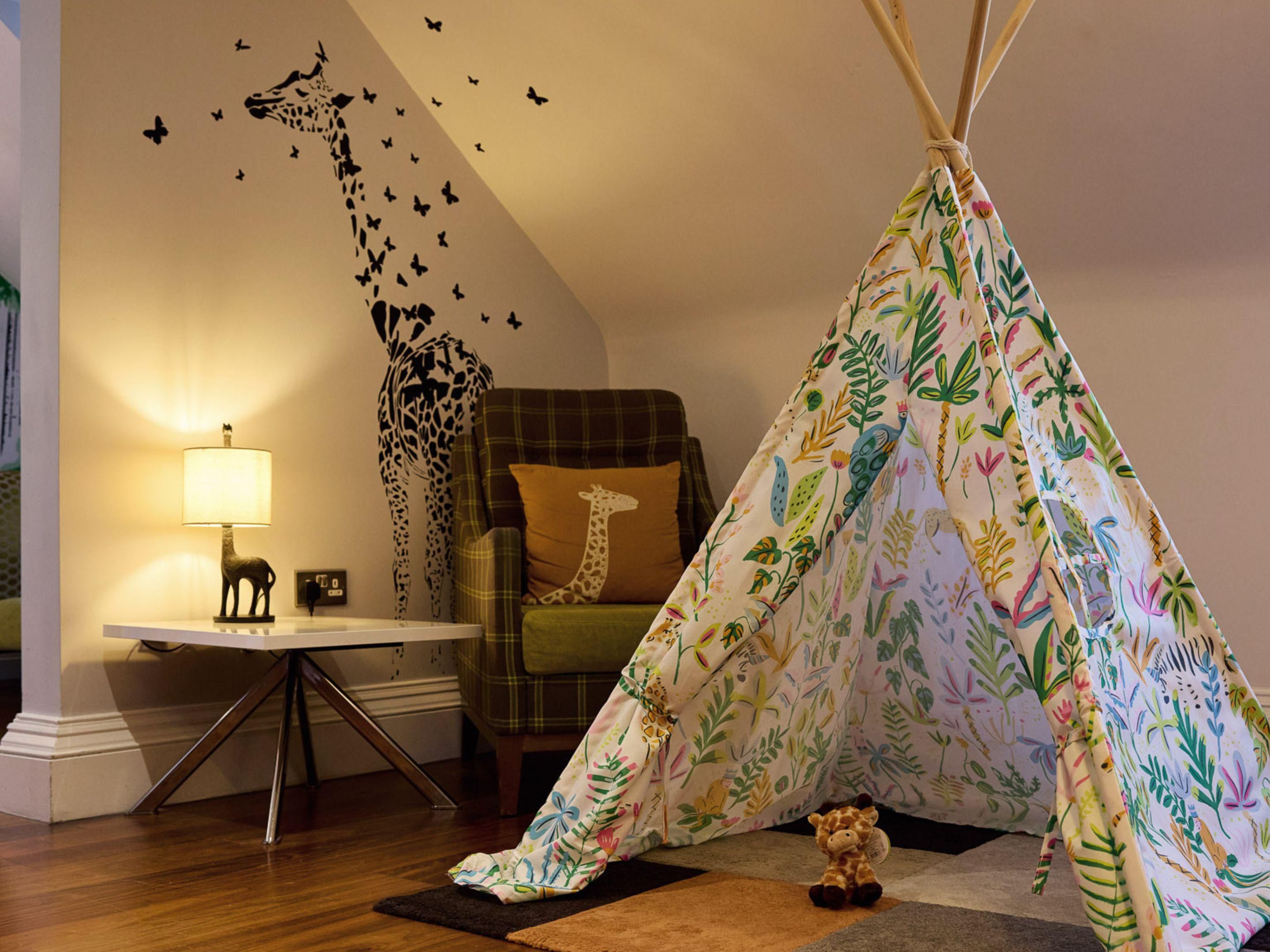 Discover our exclusive Giraffe Package, offering a stay in a giraffe-themed suite, breakfast, and tickets to Edinburgh Zoo. Young explorers will delight in a unique glamping experience with their own tepee, inflatable mattress, and themed bedding. Every booking includes a donation to RZSS, supporting vital wildlife conservation efforts.