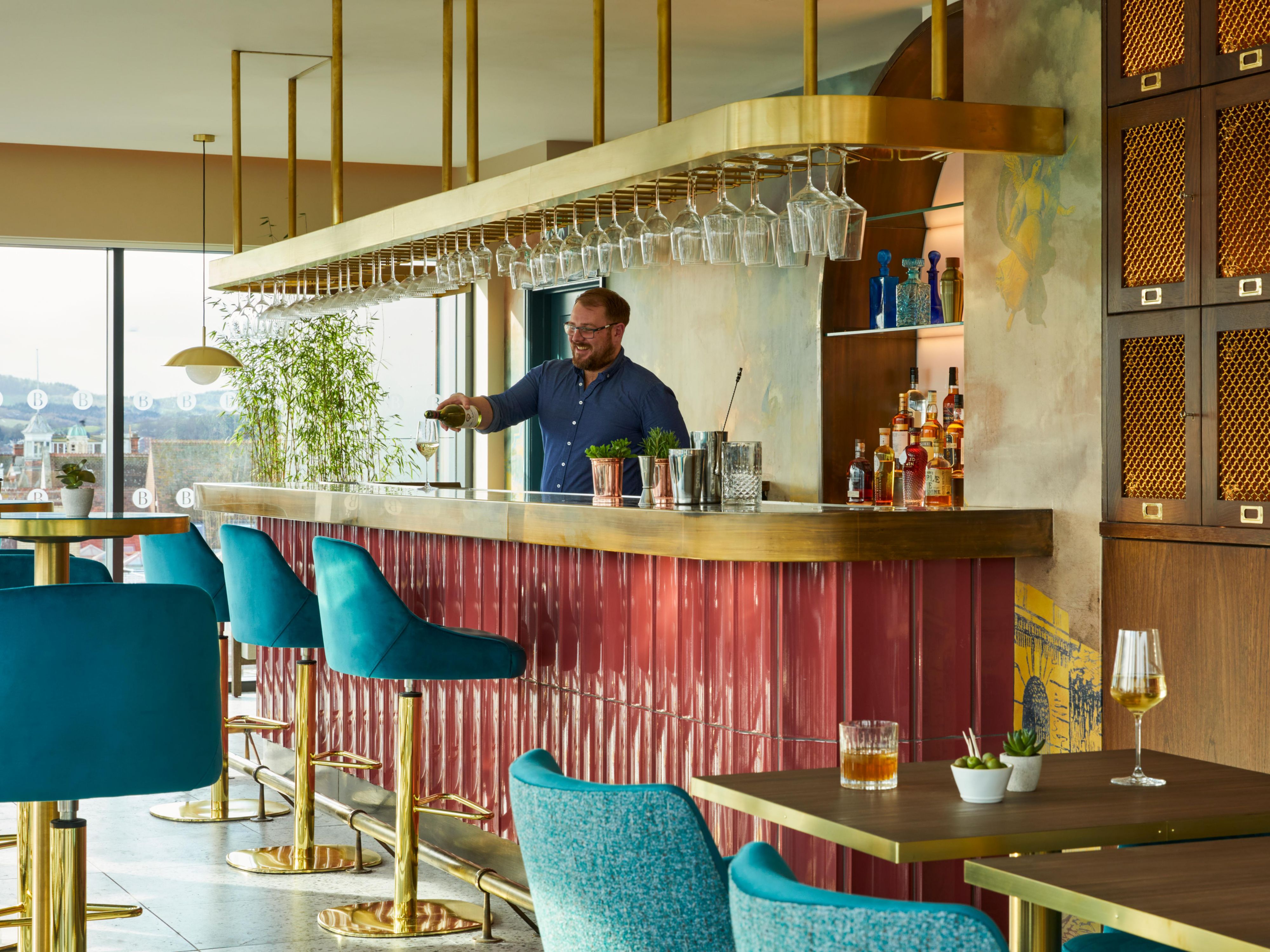 A warm welcome awaits you at Beckett's Rooftop Bar. As you take your first sip, sit back and savour the striking views of Exeter City.