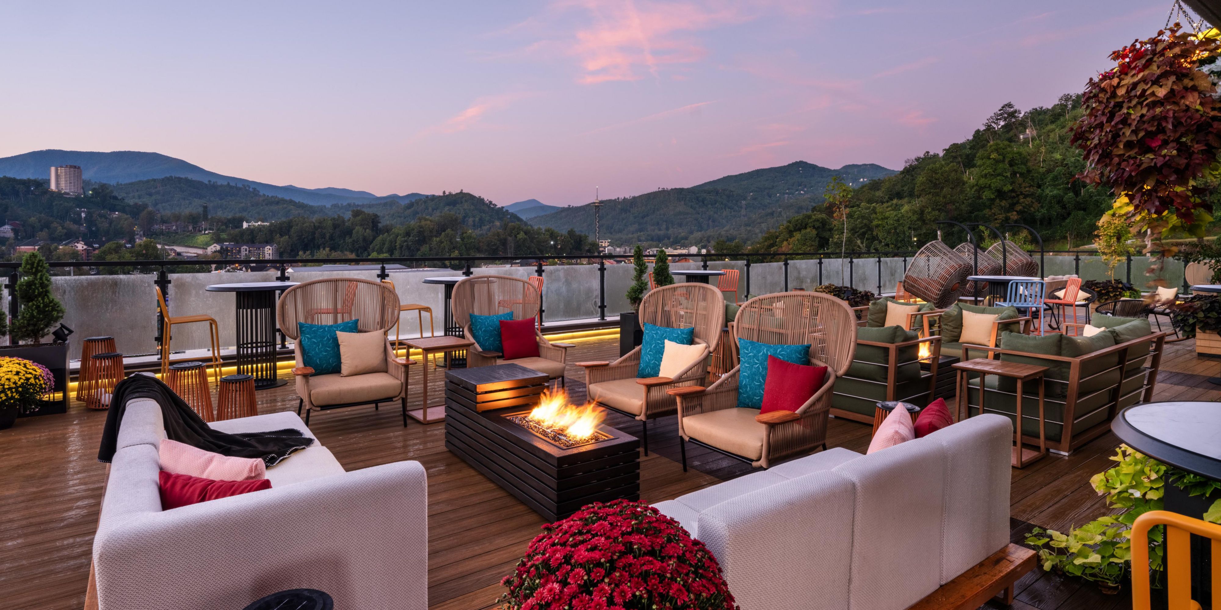 Rooftop sunsets warmed by the glow of the fire 