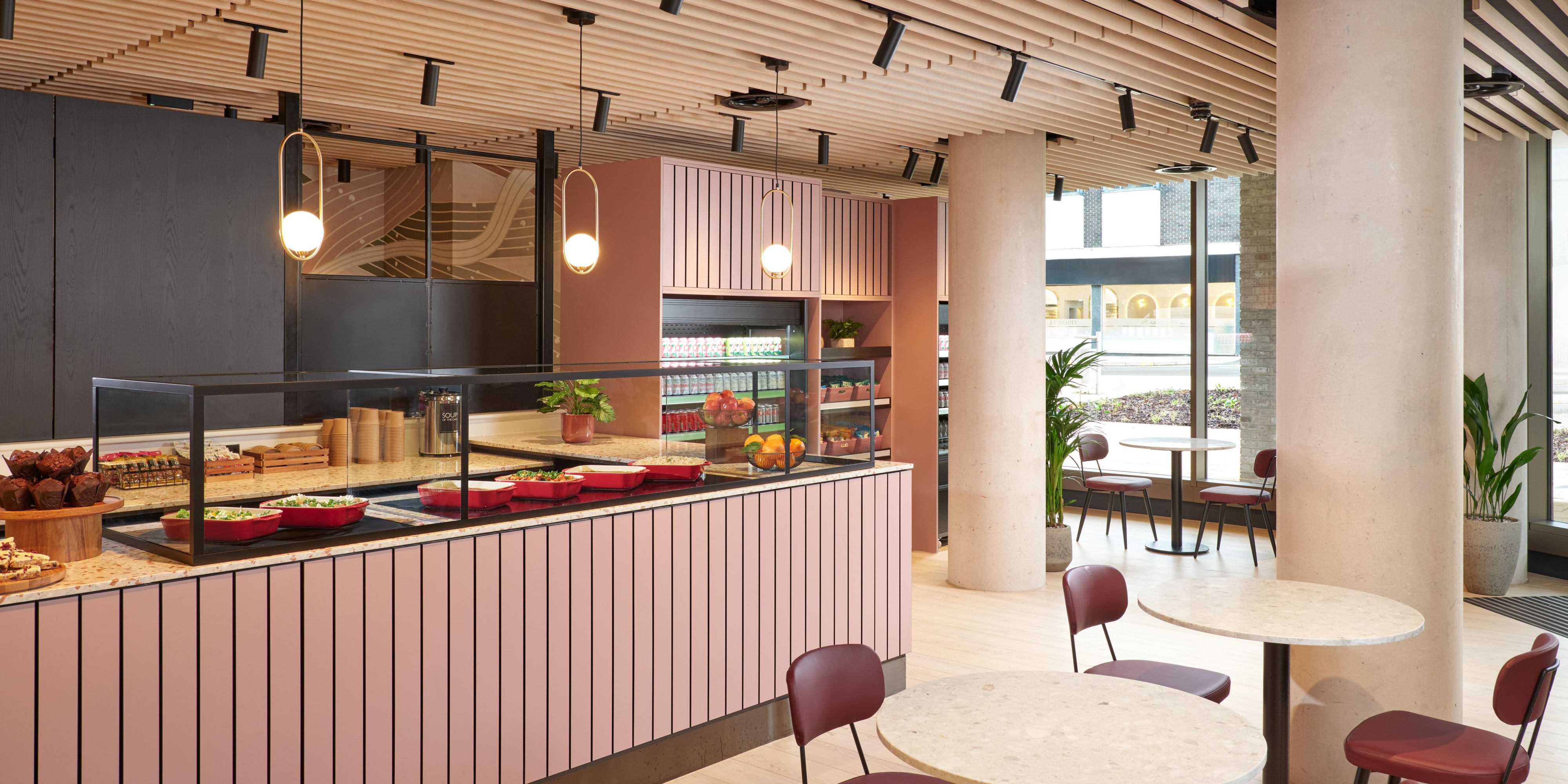 pink themed care with plenty seating, and natural bright lighting